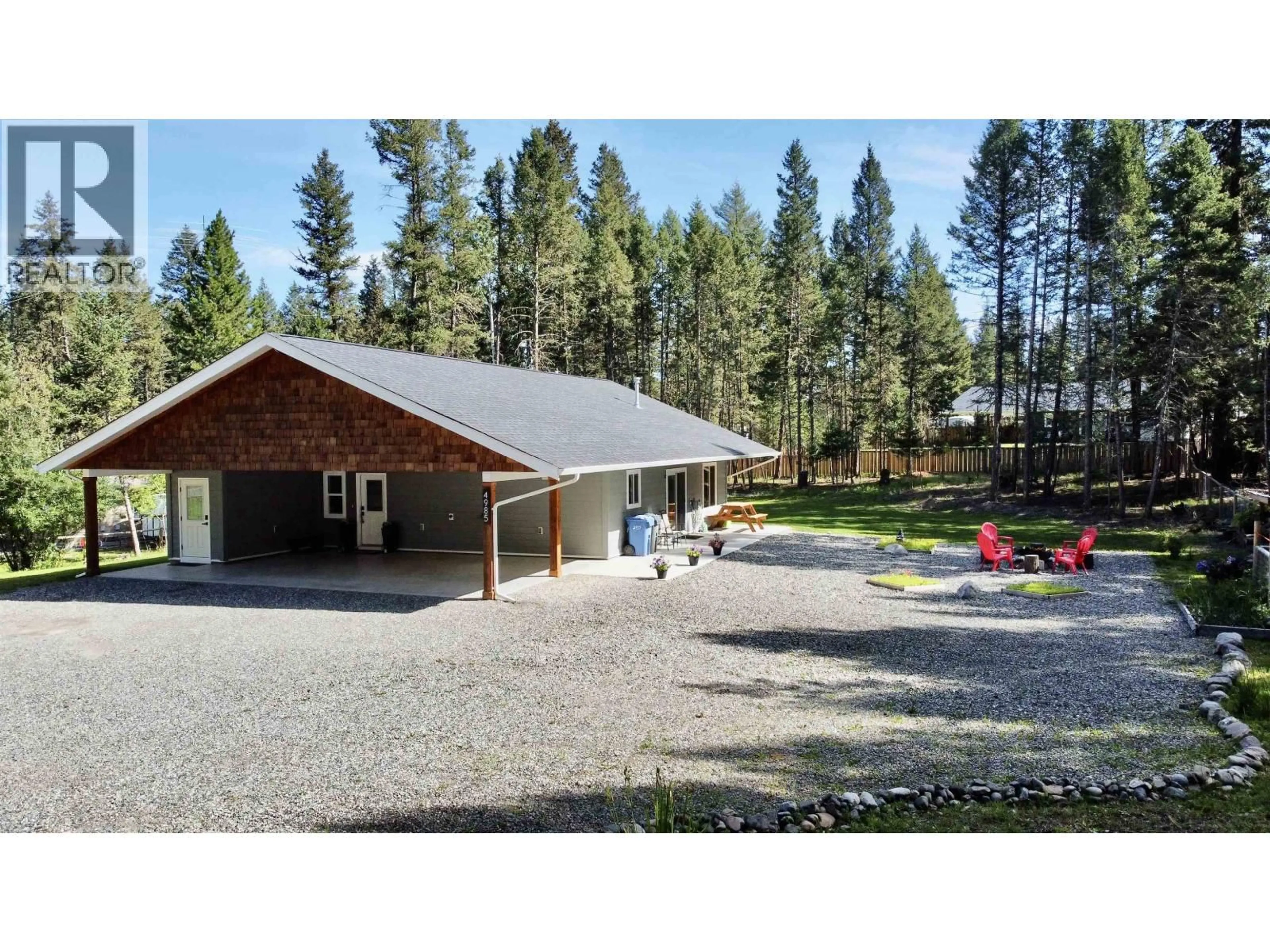 A pic from outside/outdoor area/front of a property/back of a property/a pic from drone, unknown for 4985 KYLLO ROAD, 108 Mile Ranch British Columbia V0K2Z0