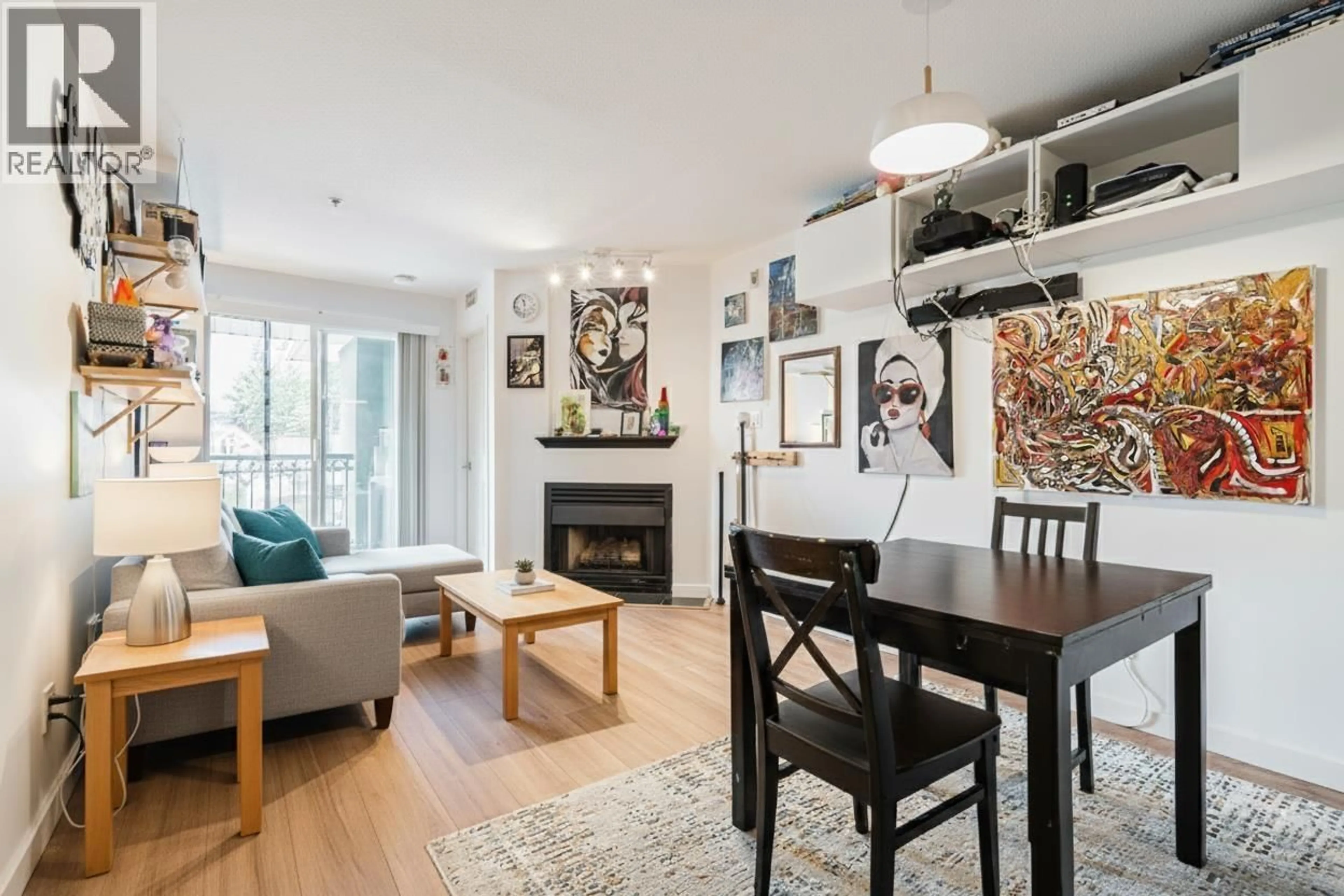 Living room with furniture, wood/laminate floor for 212 - 868 KINGSWAY, Vancouver British Columbia V6V3C3