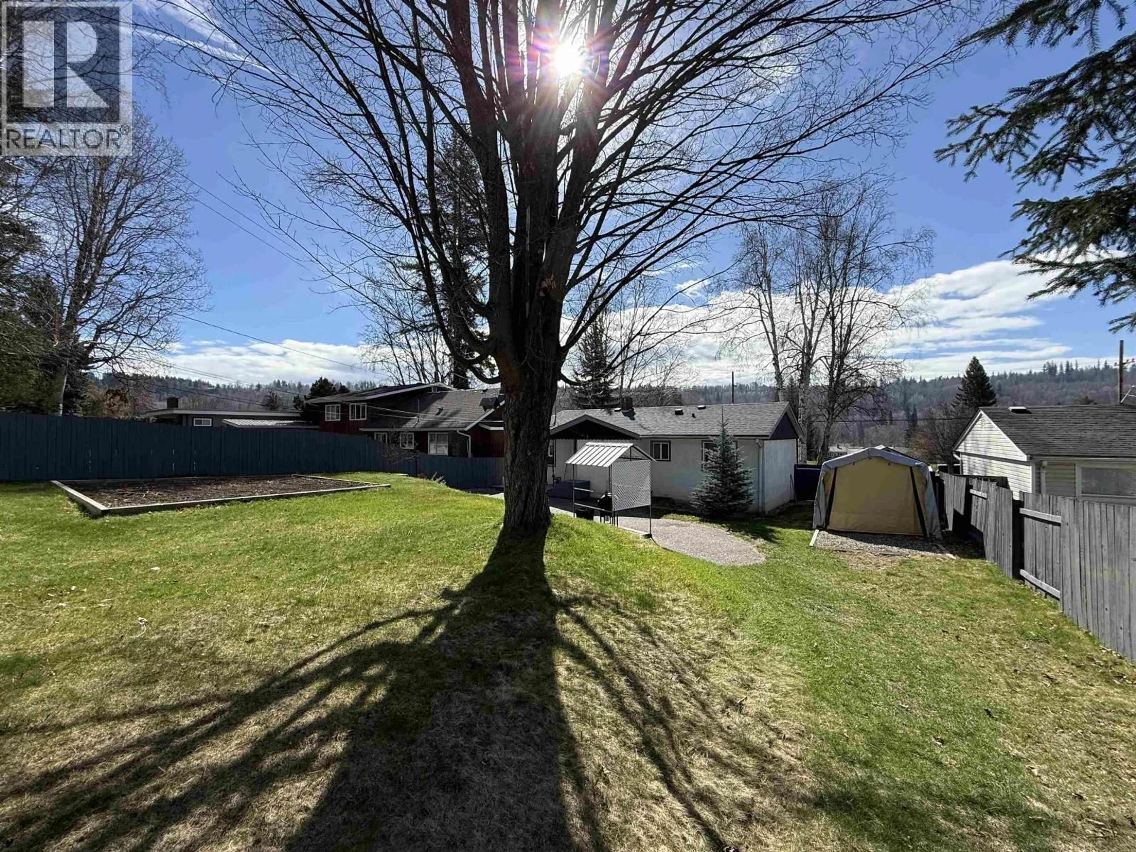 A pic from outside/outdoor area/front of a property/back of a property/a pic from drone, street for 1001 JOHNSTON AVENUE, Quesnel British Columbia V2J3B9