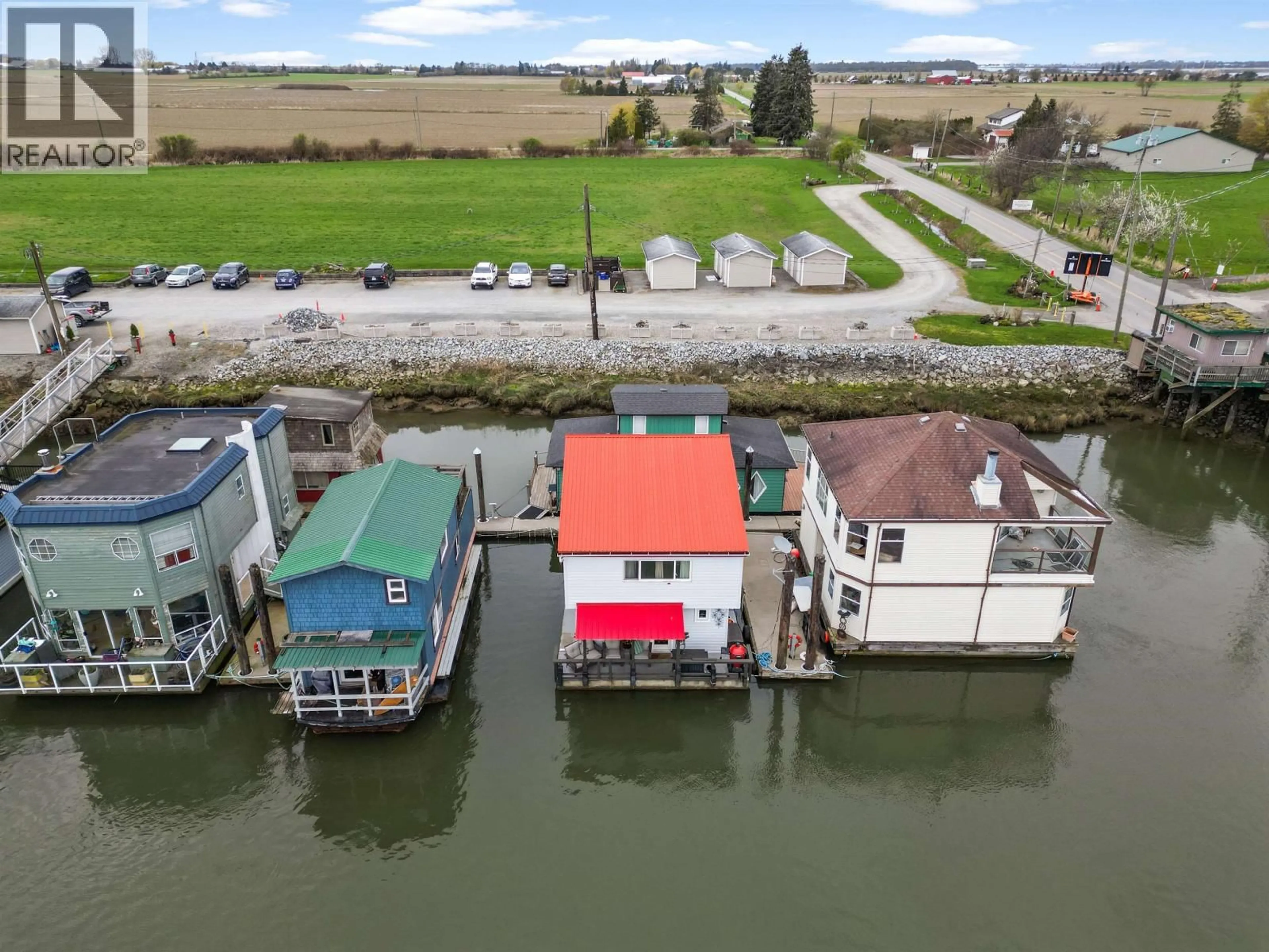 A pic from outside/outdoor area/front of a property/back of a property/a pic from drone, water/lake/river/ocean view for 3 - 3350 WESTHAM ISLAND ROAD, Ladner British Columbia V4K0A4