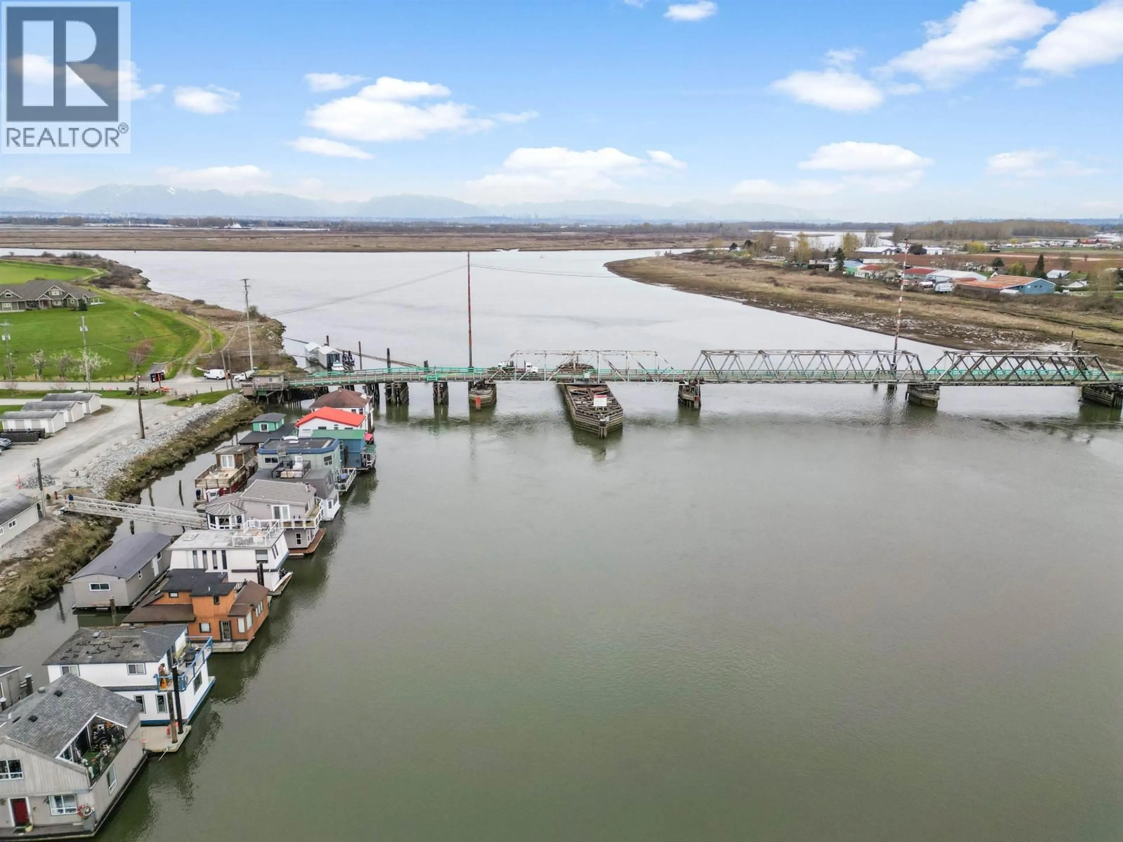 A pic from outside/outdoor area/front of a property/back of a property/a pic from drone, water/lake/river/ocean view for 3 - 3350 WESTHAM ISLAND ROAD, Ladner British Columbia V4K0A4