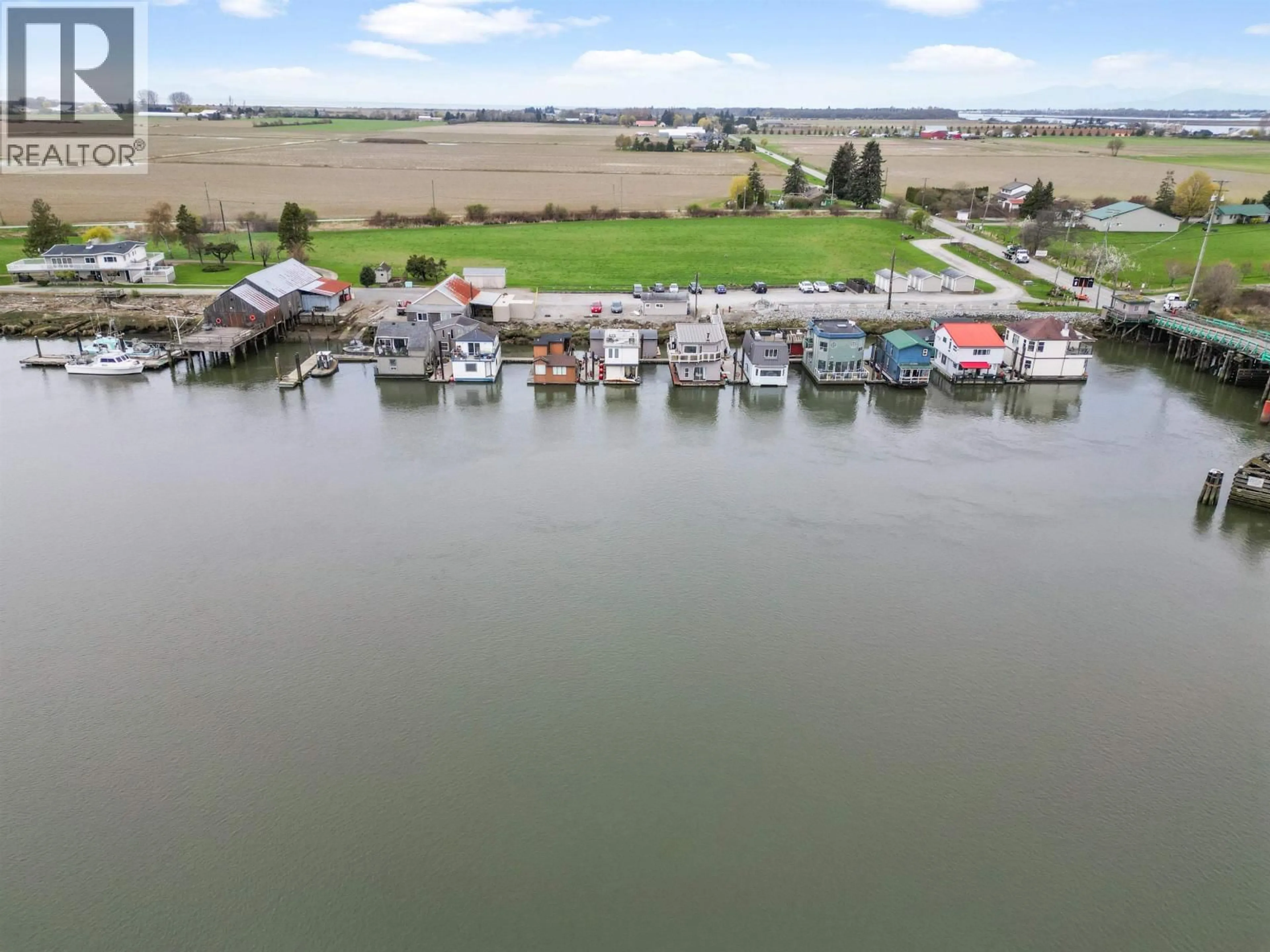 A pic from outside/outdoor area/front of a property/back of a property/a pic from drone, water/lake/river/ocean view for 3 - 3350 WESTHAM ISLAND ROAD, Ladner British Columbia V4K0A4