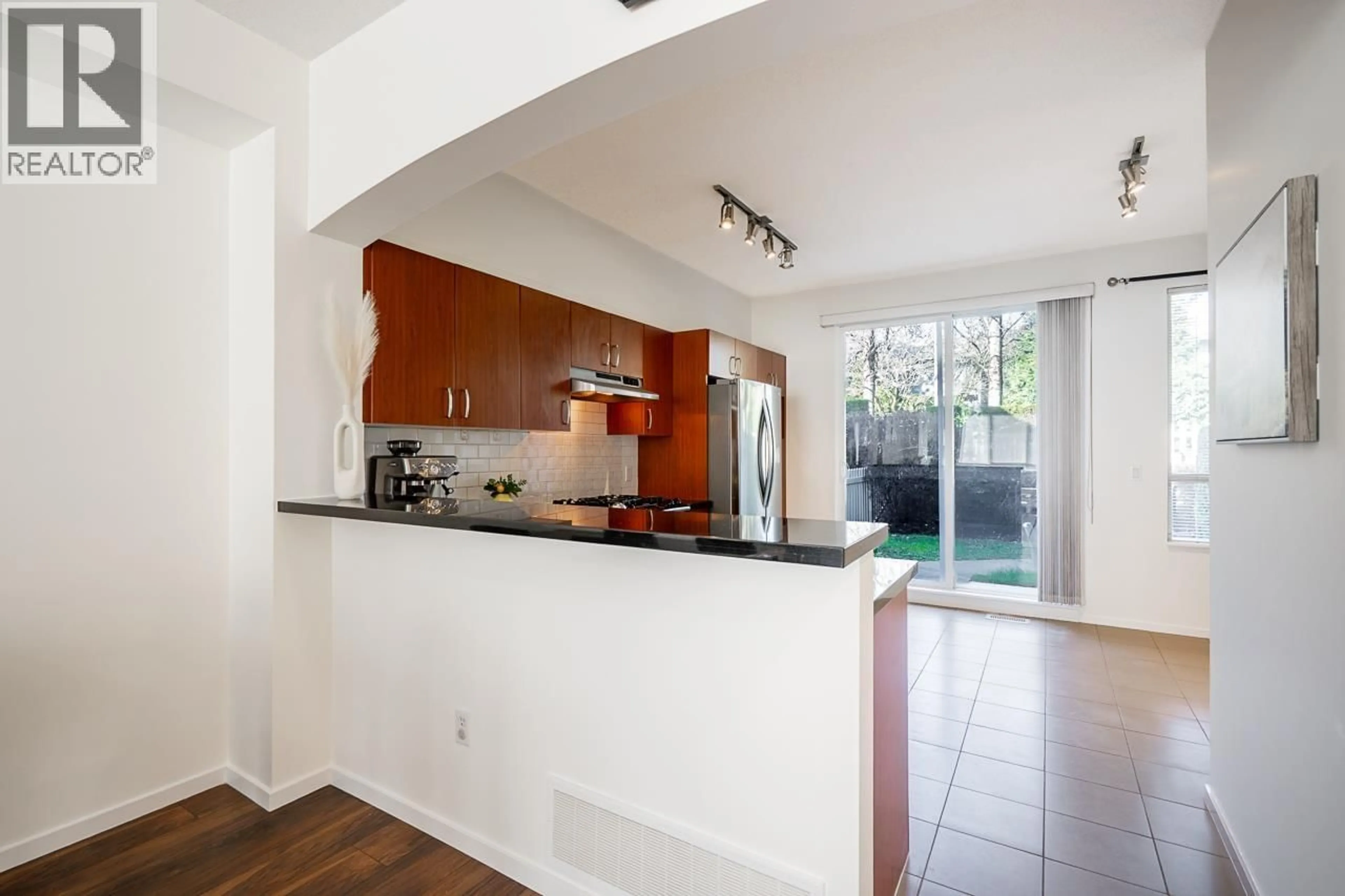 Open concept kitchen, ceramic/tile floor for 23 - 9088 HALSTON COURT, Burnaby British Columbia V3N0A7