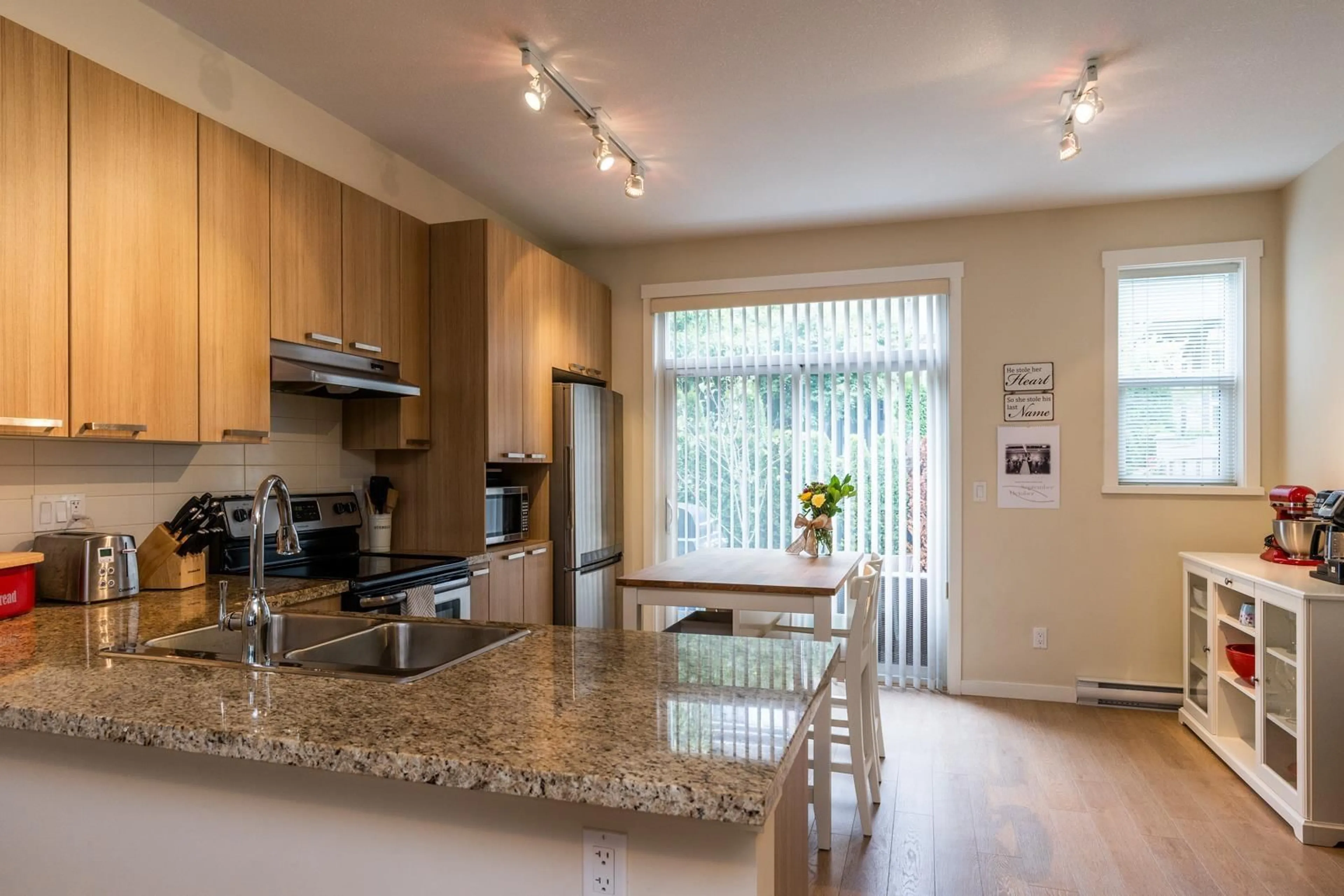 Open concept kitchen, wood/laminate floor for 50 - 14838 61 AVENUE, Surrey British Columbia V3S2P3