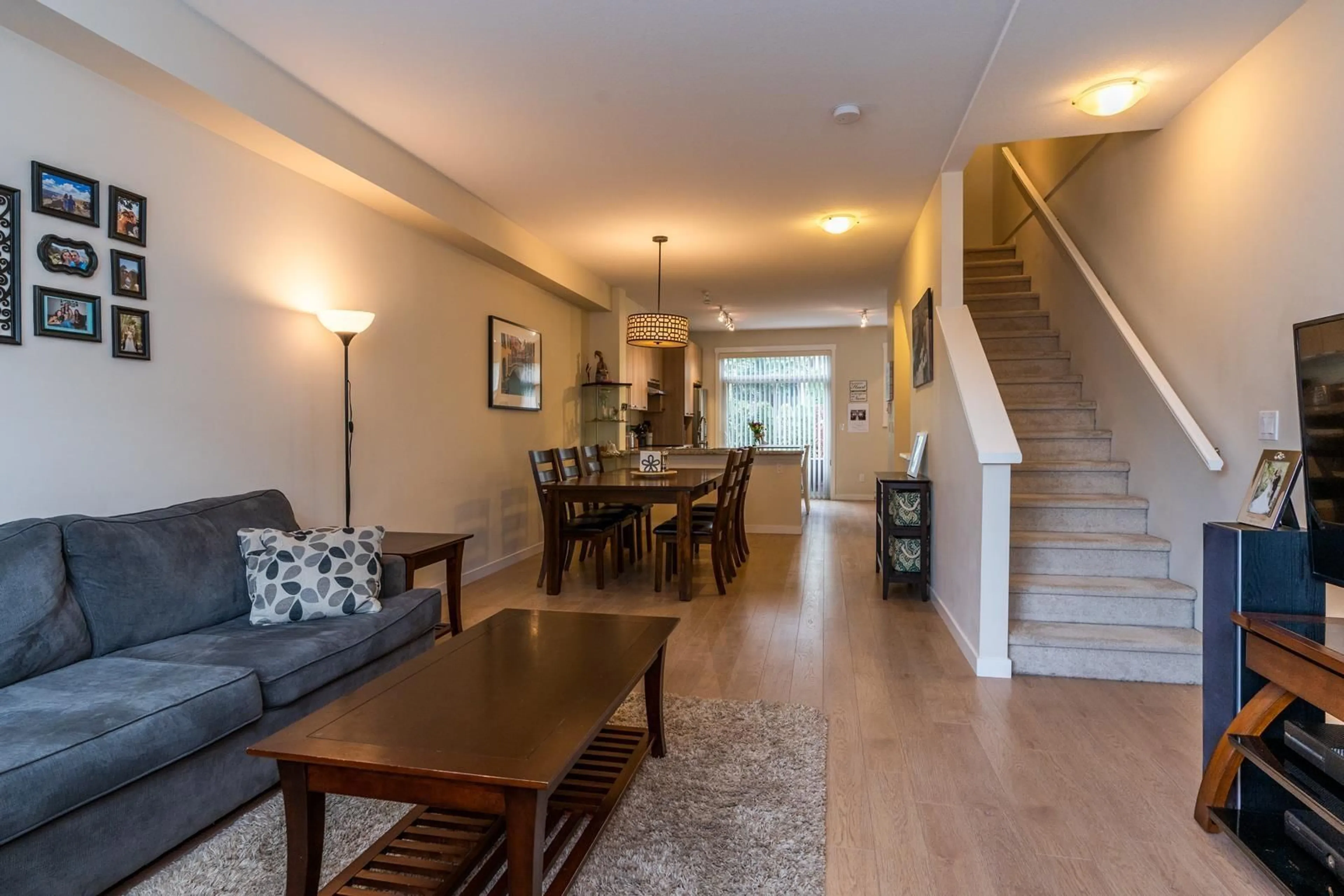Living room with furniture, wood/laminate floor for 50 - 14838 61 AVENUE, Surrey British Columbia V3S2P3