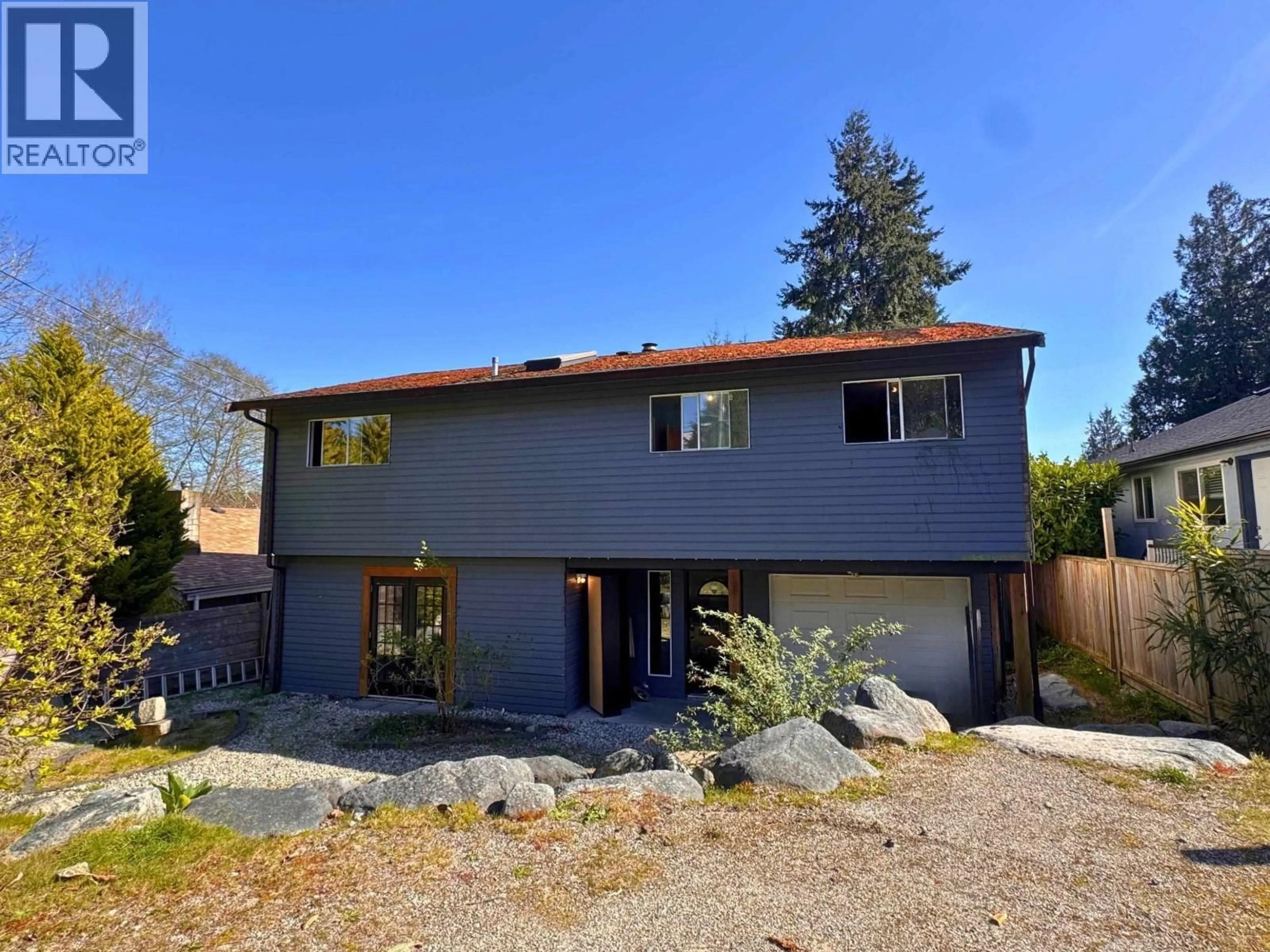 A pic from outside/outdoor area/front of a property/back of a property/a pic from drone, street for 5799 ANCHOR ROAD, Sechelt British Columbia V0N3A0