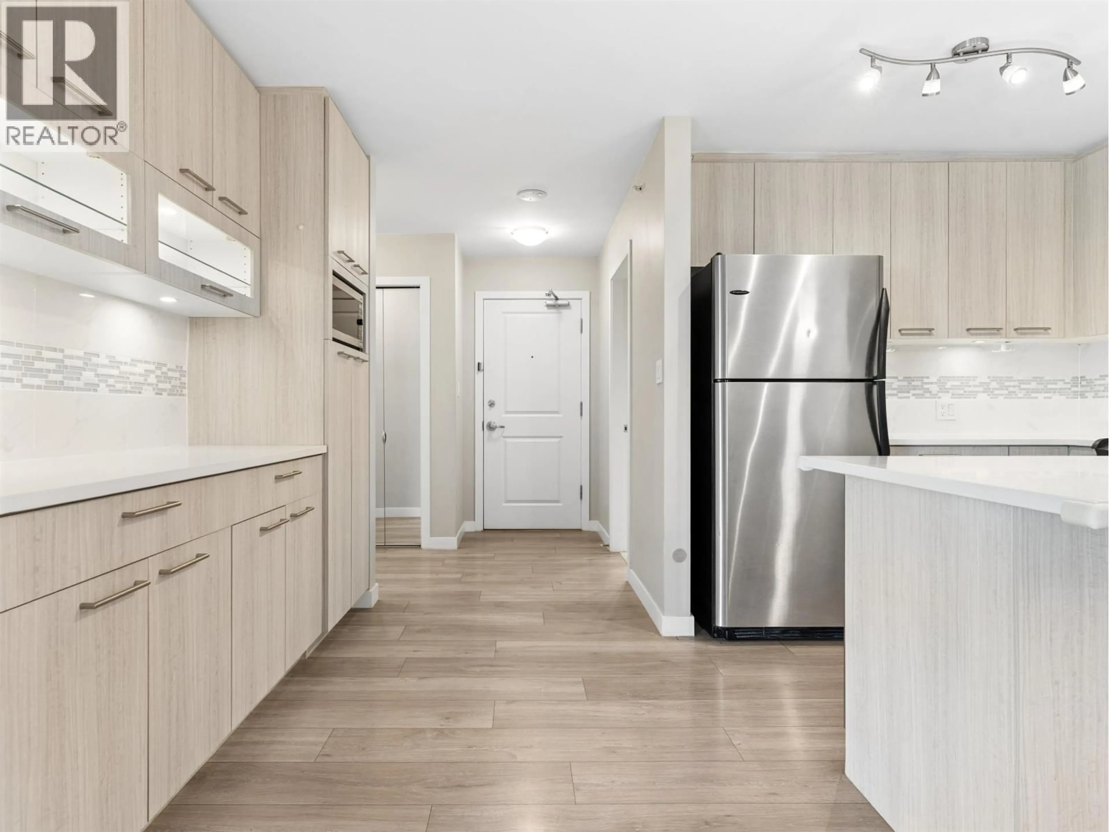 Open concept kitchen, wood/laminate floor for 219 - 8480 GRANVILLE AVENUE, Richmond British Columbia V6Y4E8