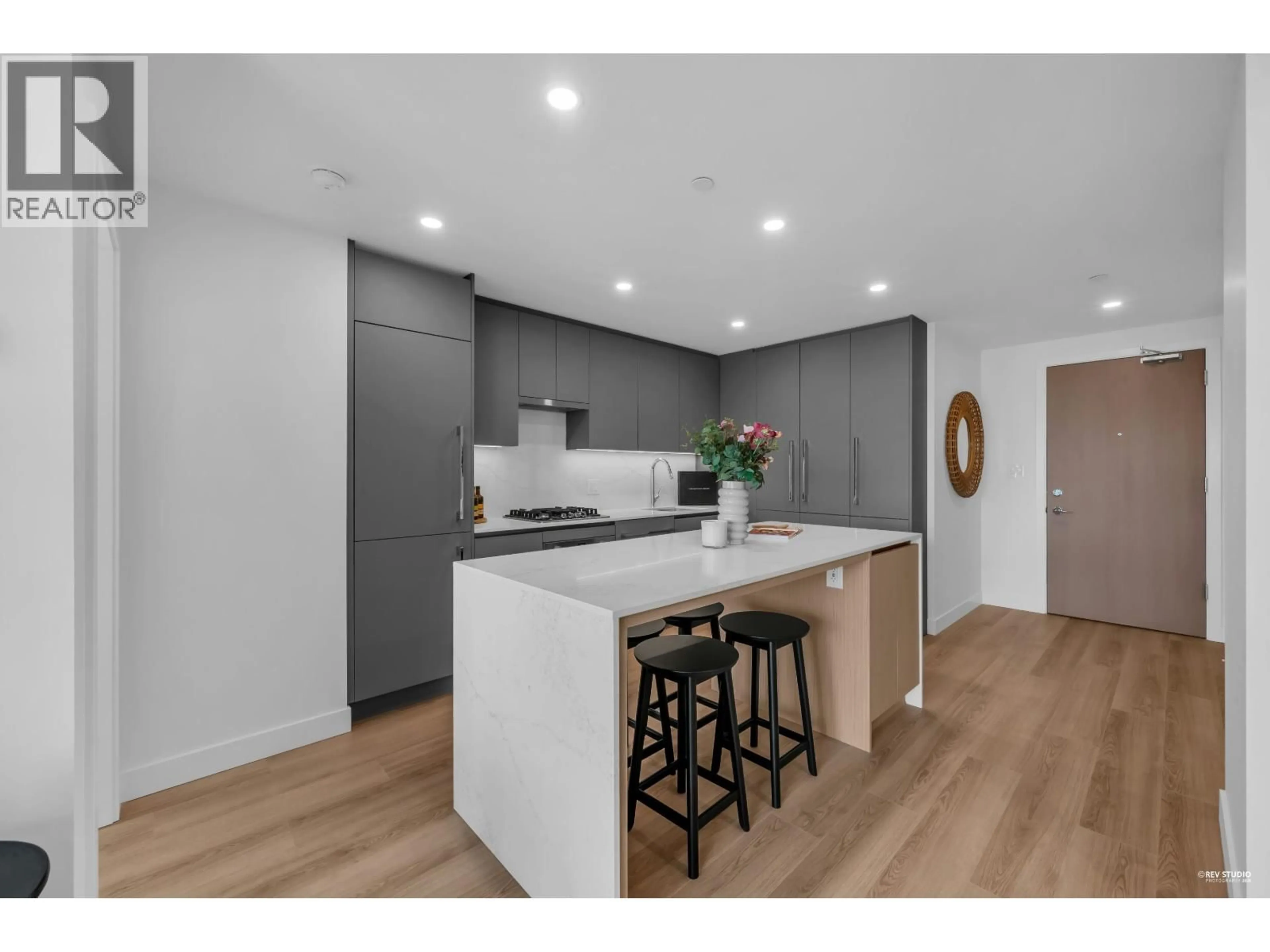 Open concept kitchen, wood/laminate floor for 801 - 5593 NO. 3 ROAD, Richmond British Columbia V6X0X6