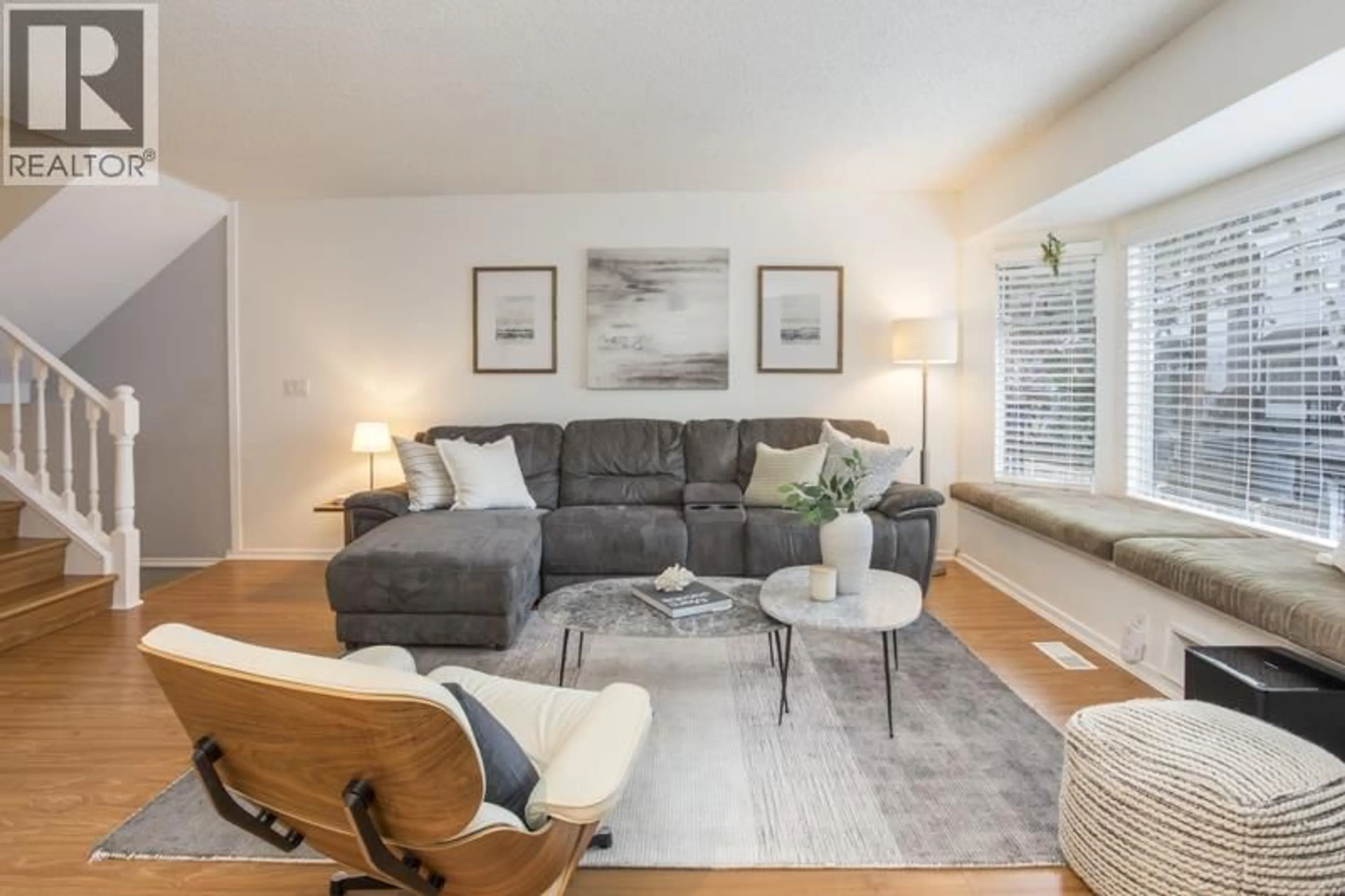 Living room with furniture, wood/laminate floor for 27 - 1195 FALCON DRIVE, Coquitlam British Columbia V3E2H1