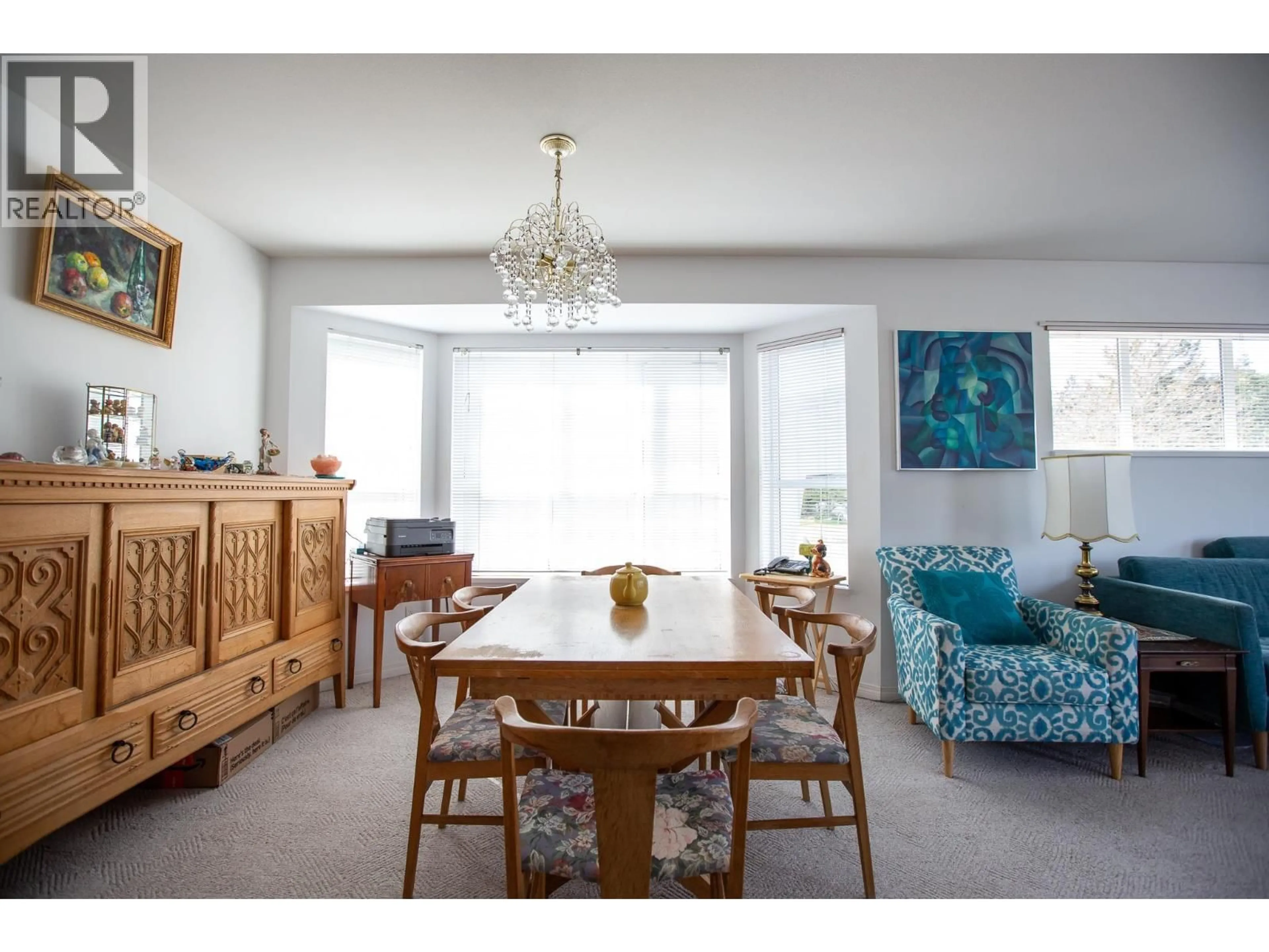 Dining room, wood/laminate floor for 307 - 5711 MERMAID STREET, Sechelt British Columbia V7Z0J6