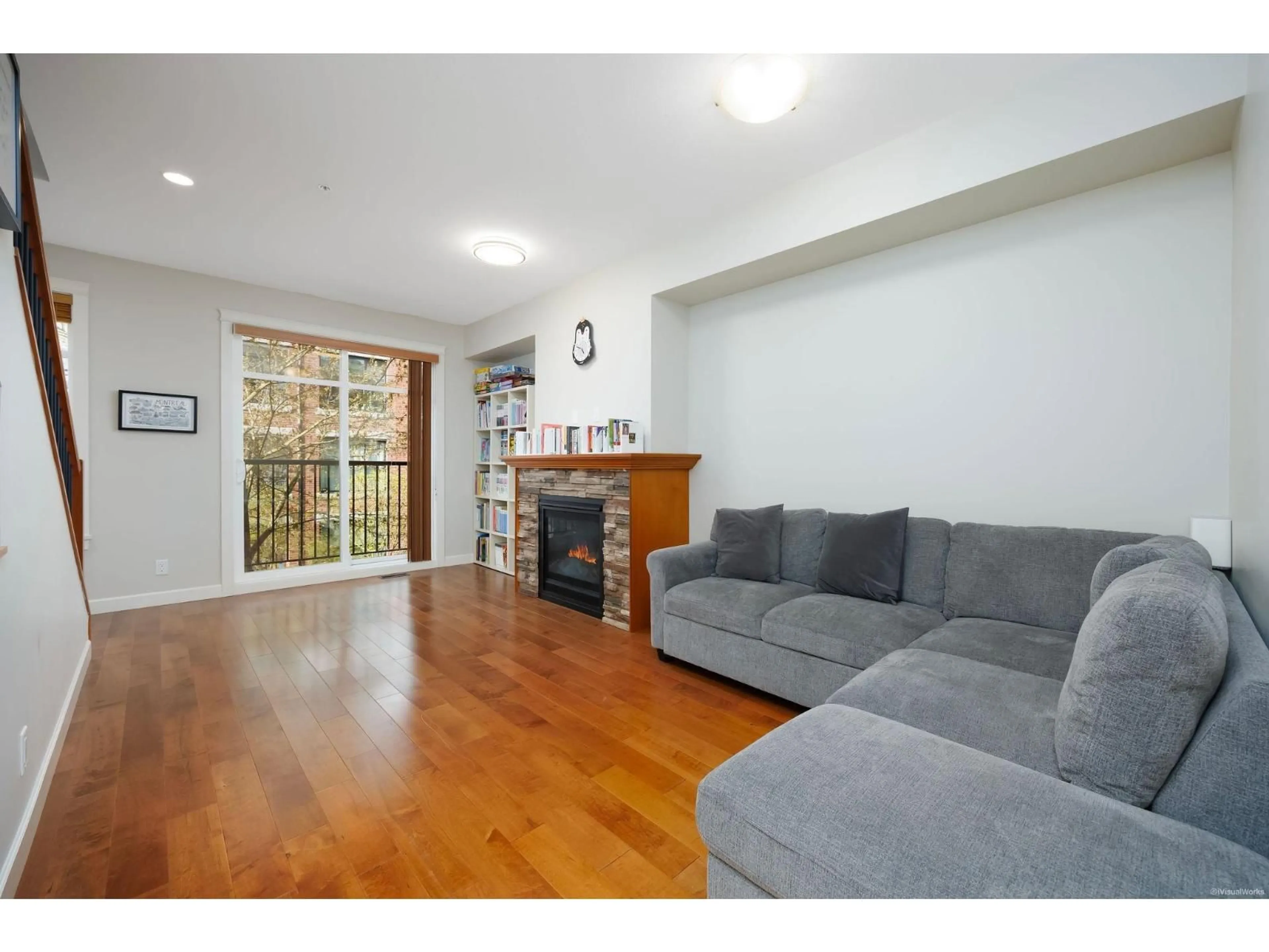 Living room with furniture, wood/laminate floor for 55 - 8068 207 STREET, Langley British Columbia V2Y0M9