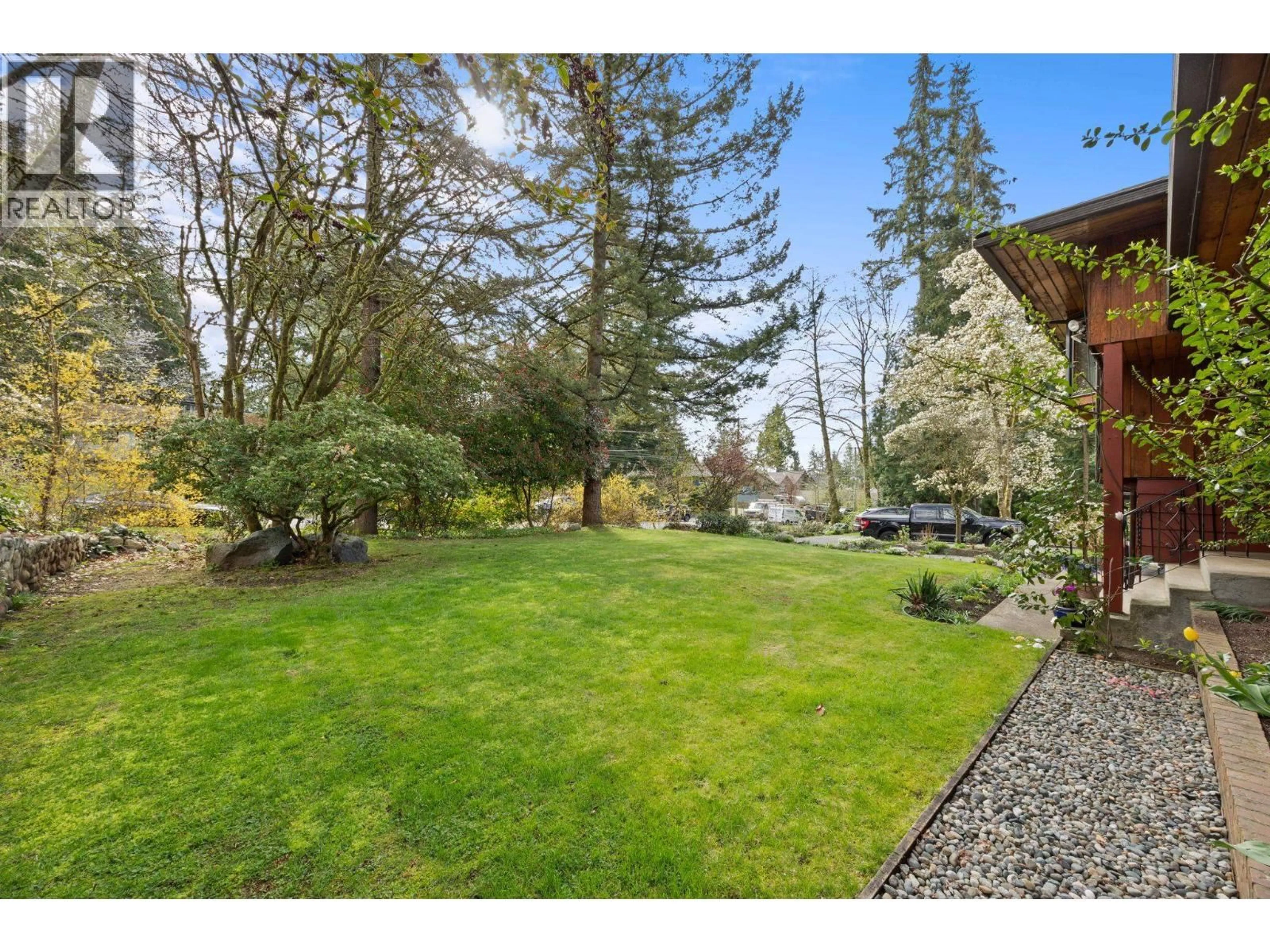 A pic from outside/outdoor area/front of a property/back of a property/a pic from drone, unknown for 4589 RAMSAY ROAD, North Vancouver British Columbia V7K2N6