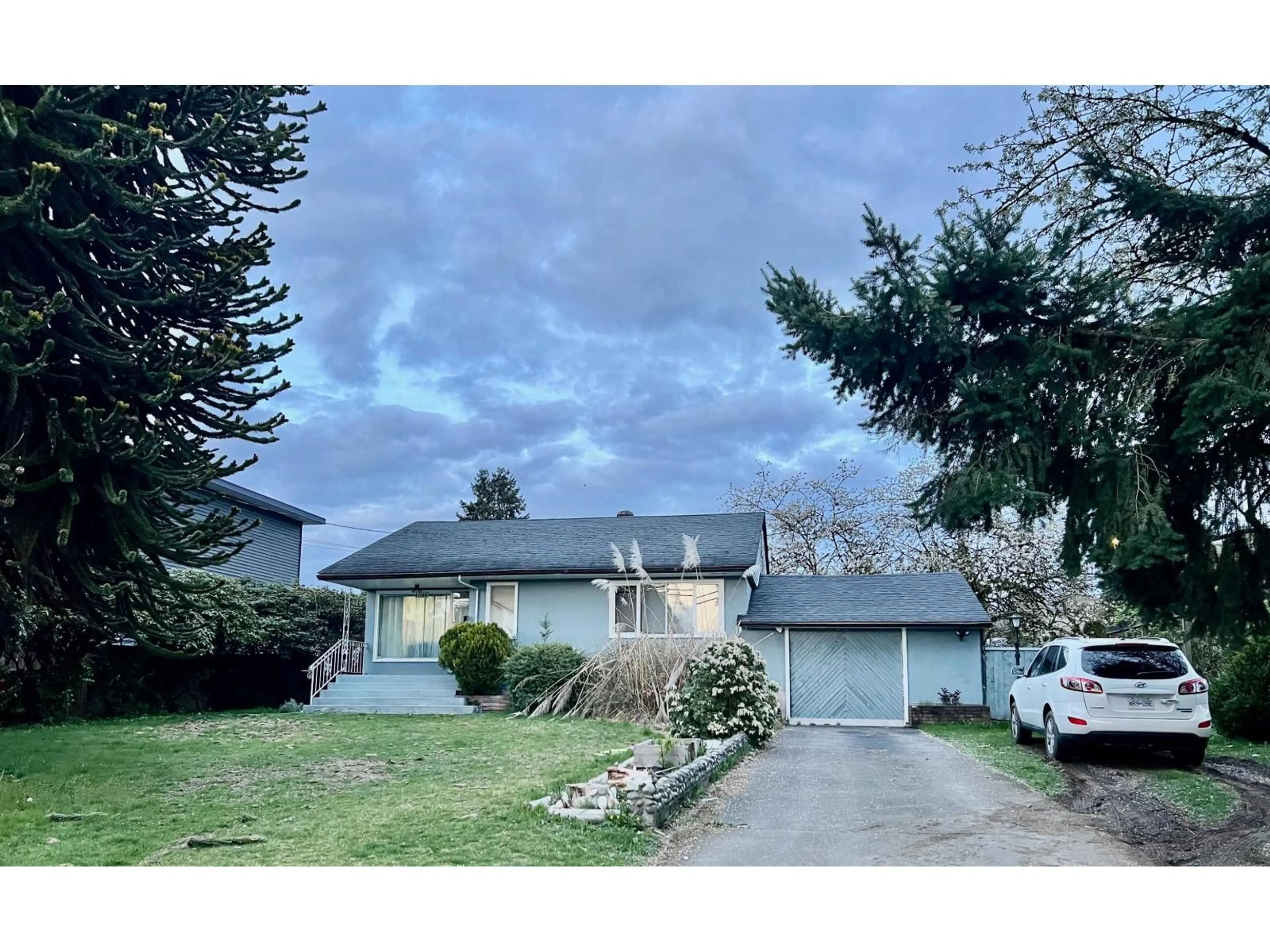 A pic from outside/outdoor area/front of a property/back of a property/a pic from drone, street for 11108 136 STREET, Surrey British Columbia V3R3B5