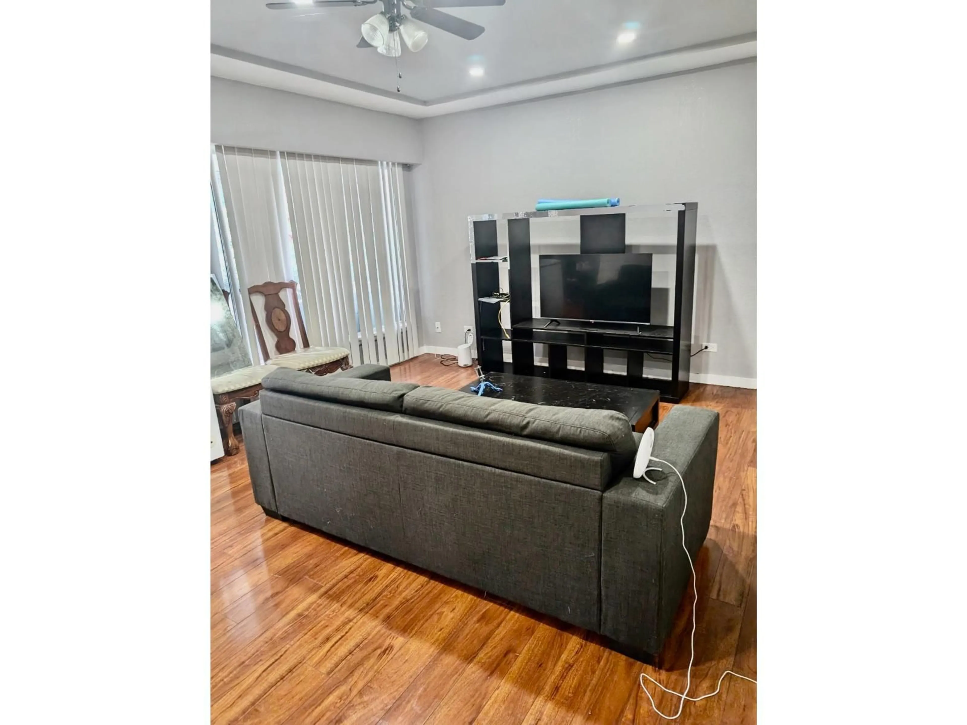 Living room with furniture, wood/laminate floor for 11108 136 STREET, Surrey British Columbia V3R3B5