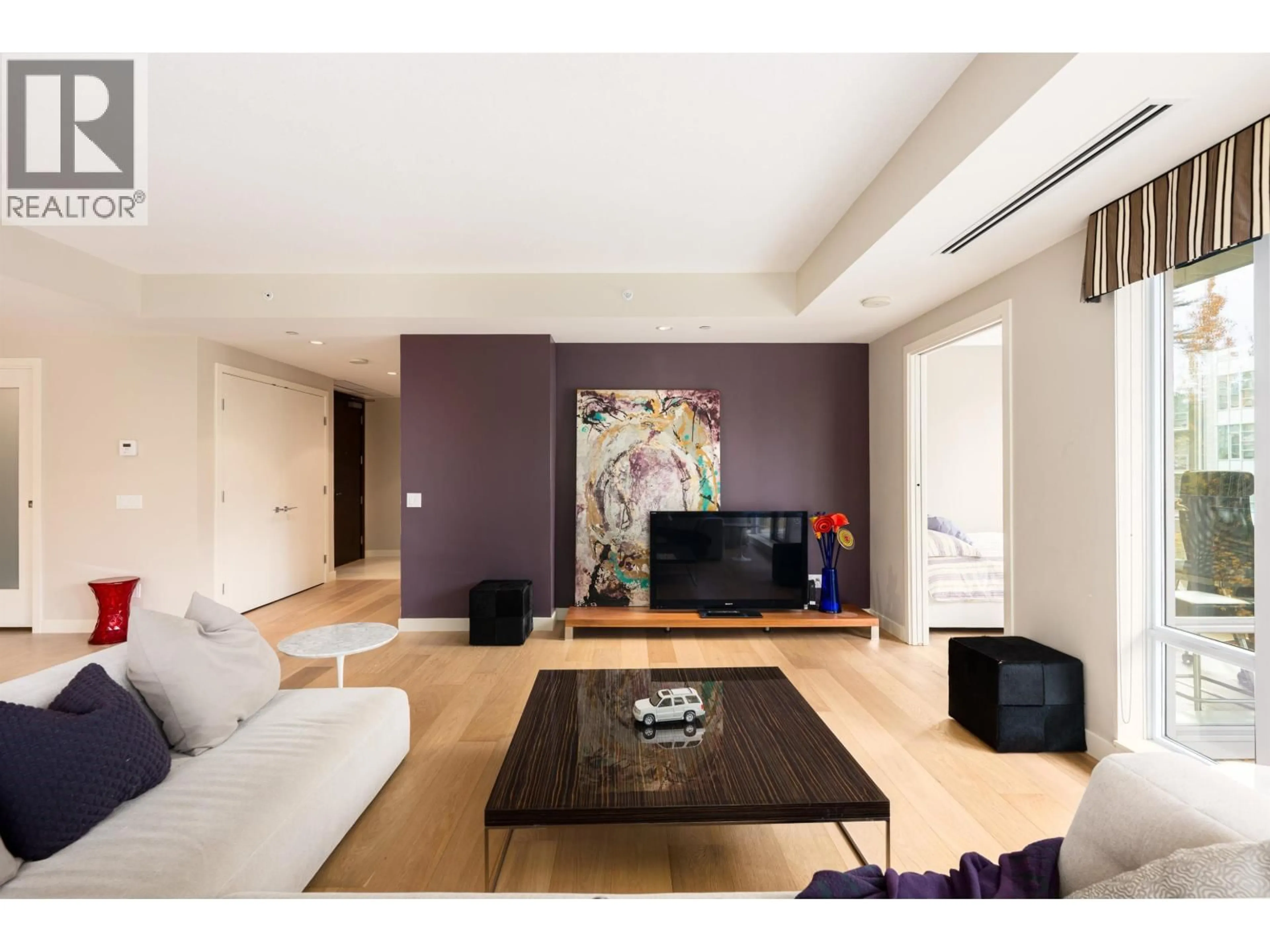 Living room with furniture, wood/laminate floor for 403 - 5838 BERTON AVENUE, Vancouver British Columbia V6S0A5