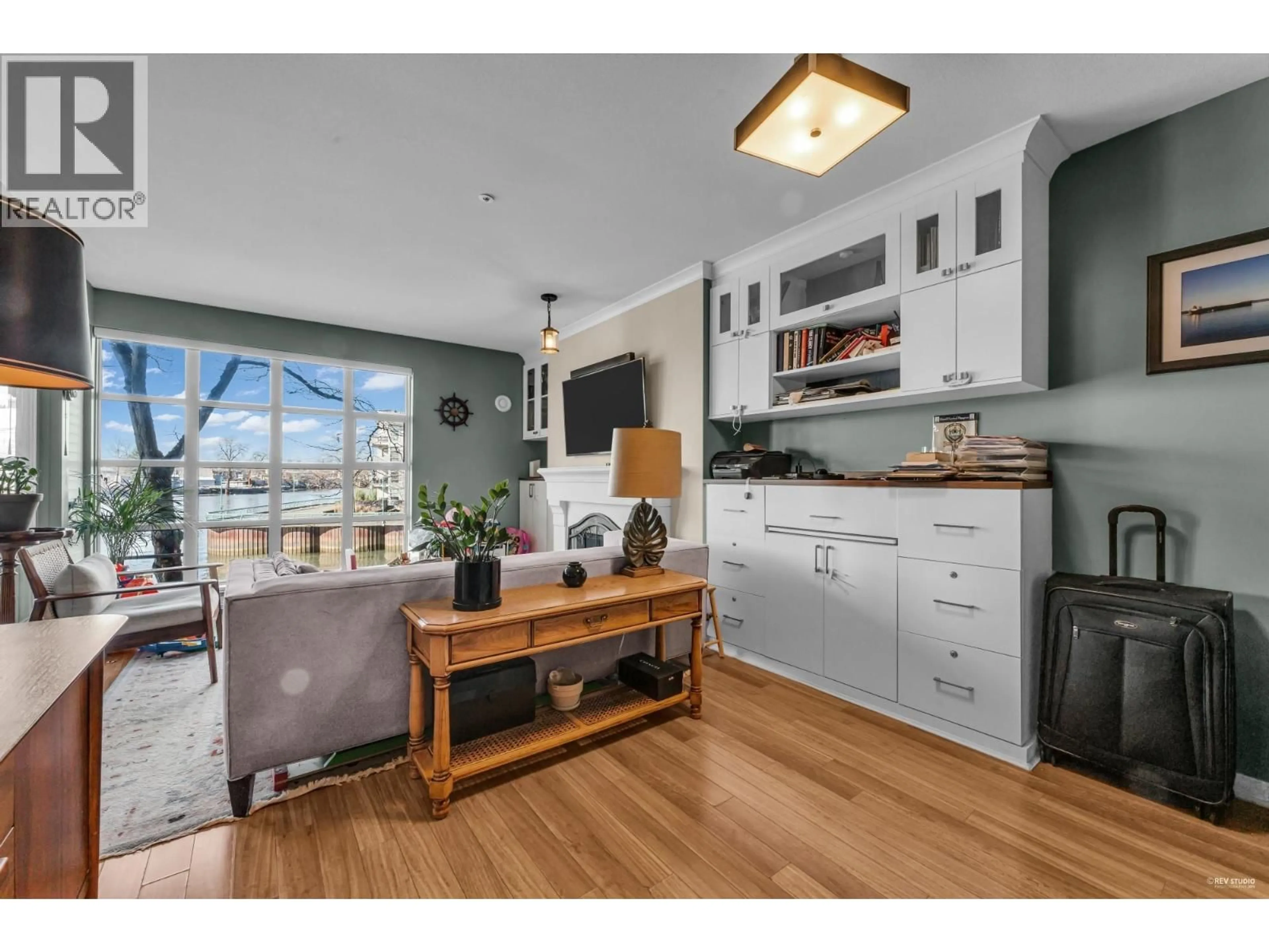 Open concept kitchen, wood/laminate floor for 208 - 2020 KENT AVENUE SOUTH, Vancouver British Columbia V5P4X1