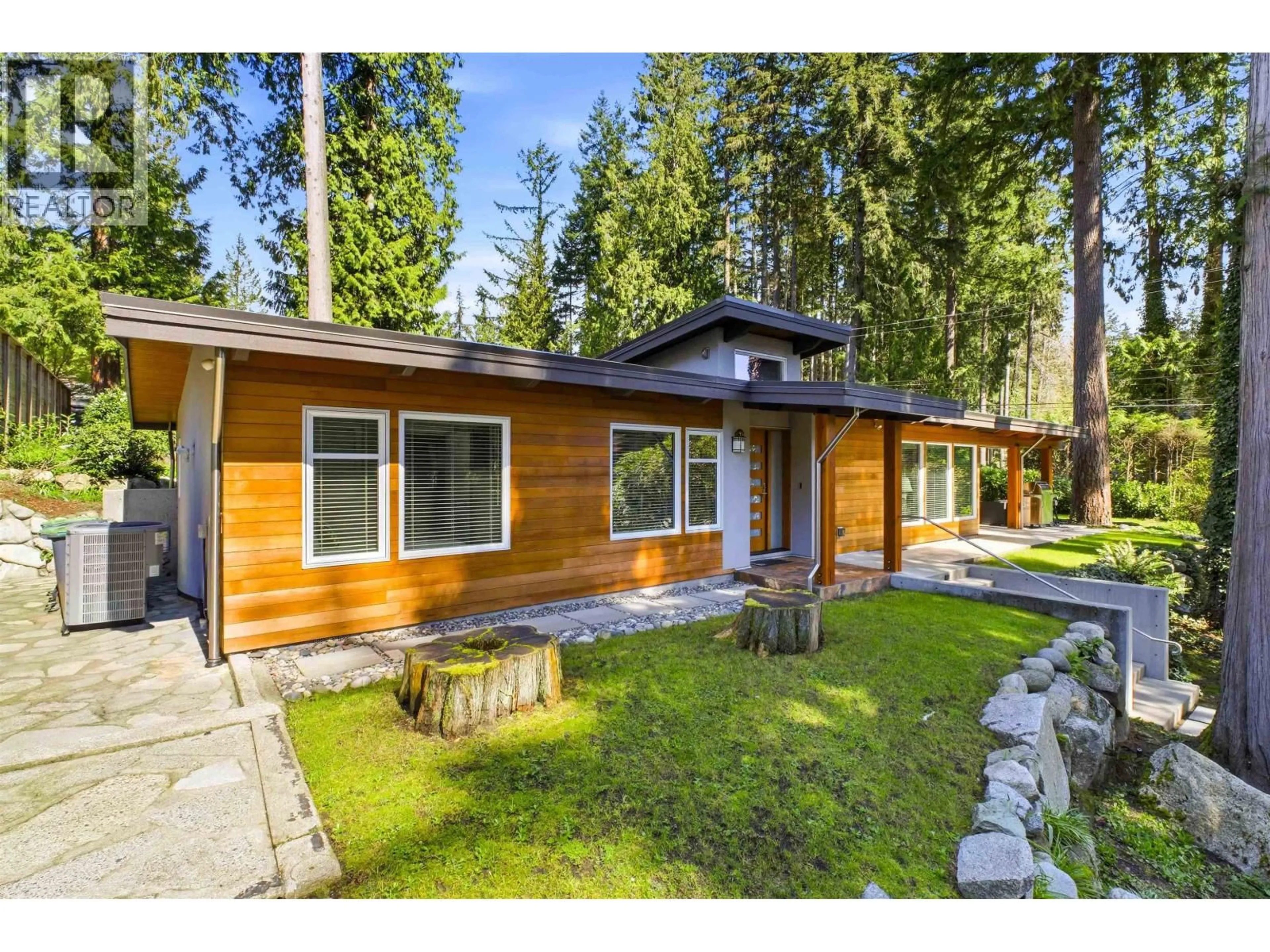 Home with vinyl exterior material, forest/trees view for 672 ST JAMES ROAD, North Vancouver British Columbia V7N1L6