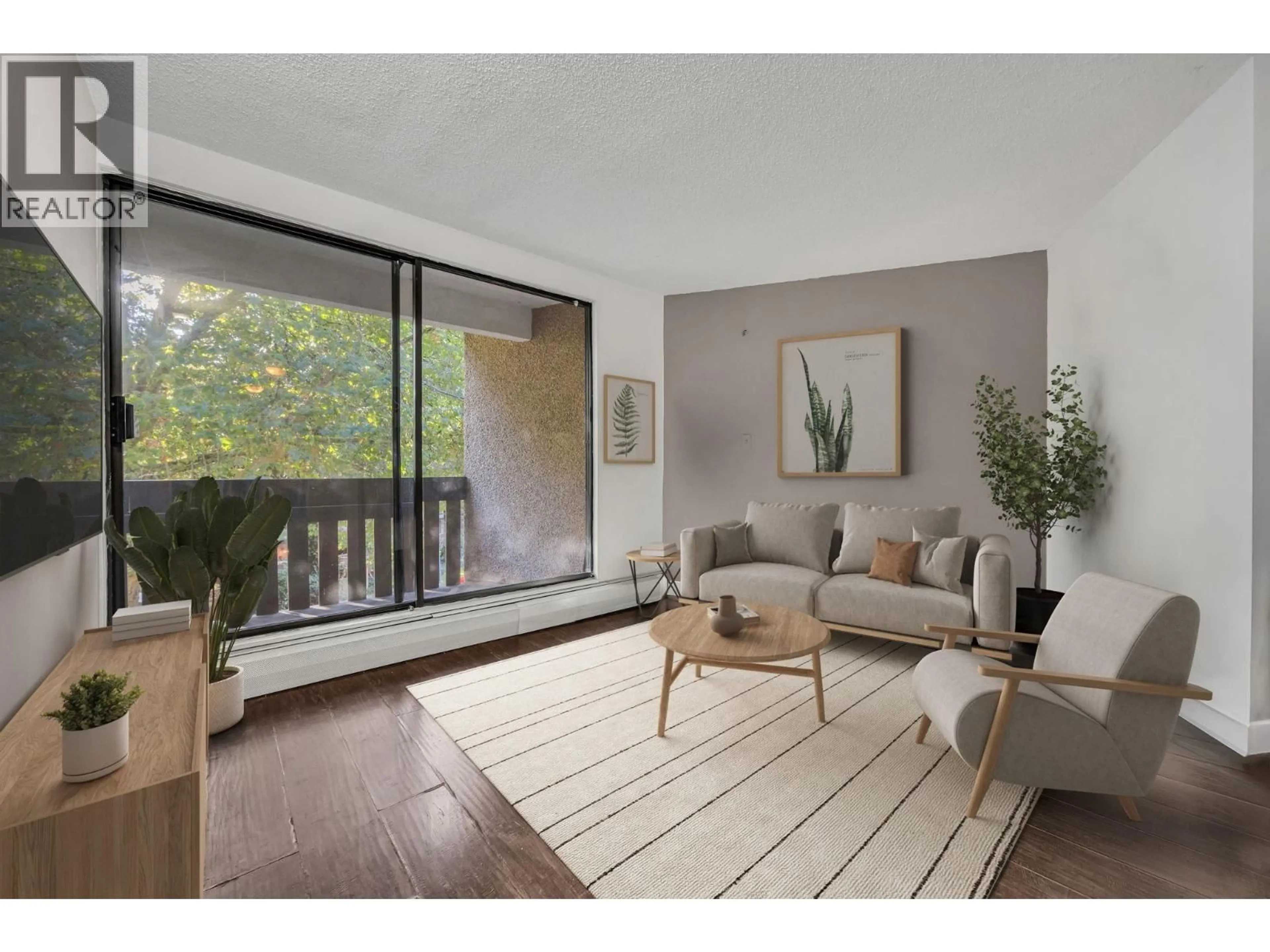 Living room with furniture, wood/laminate floor for 211 - 8640 CITATION DRIVE, Richmond British Columbia V6Y3A3