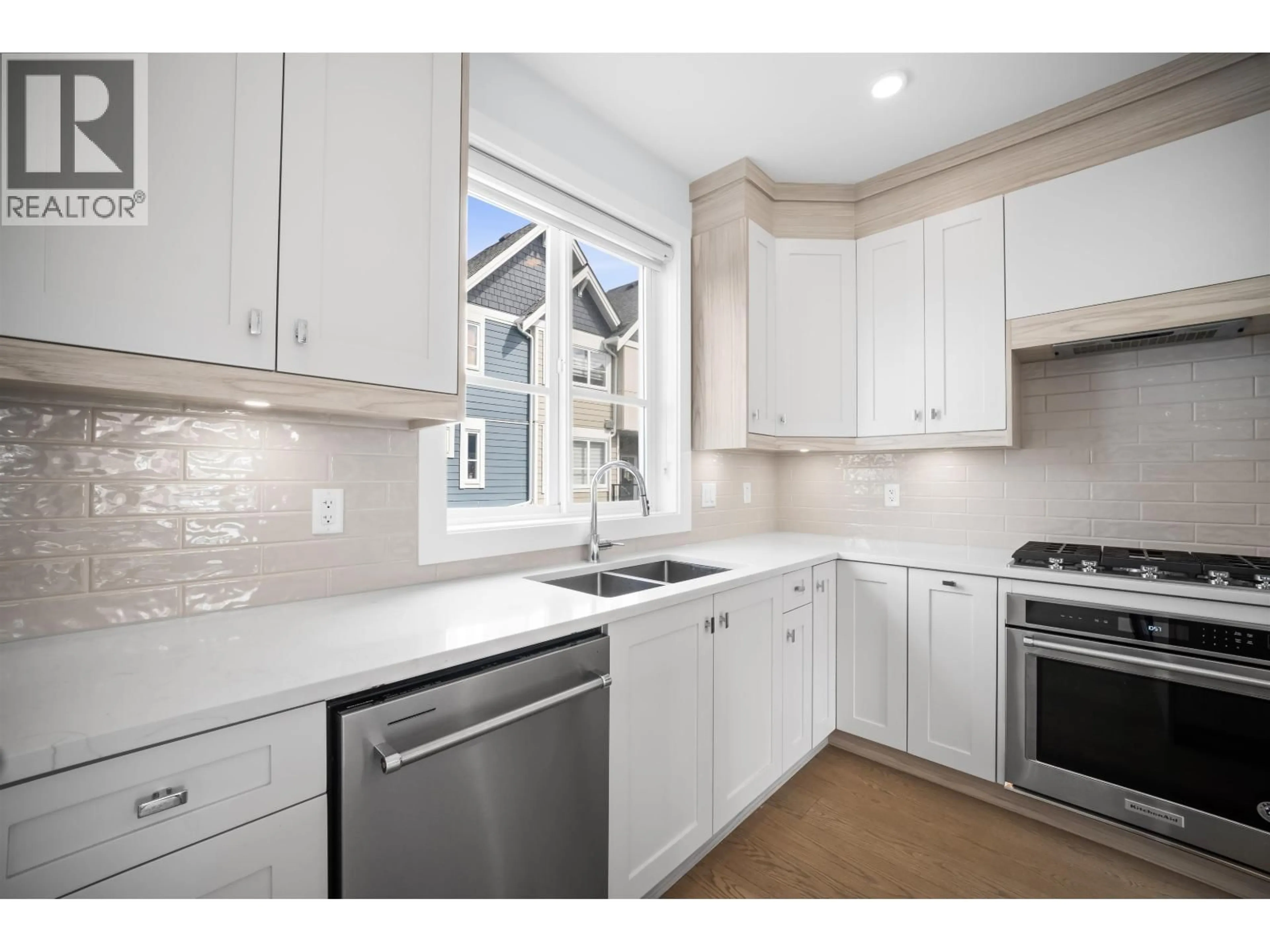 Open concept kitchen, ceramic/tile floor for 7 - 5377 8A AVENUE, Delta British Columbia V4M0E2