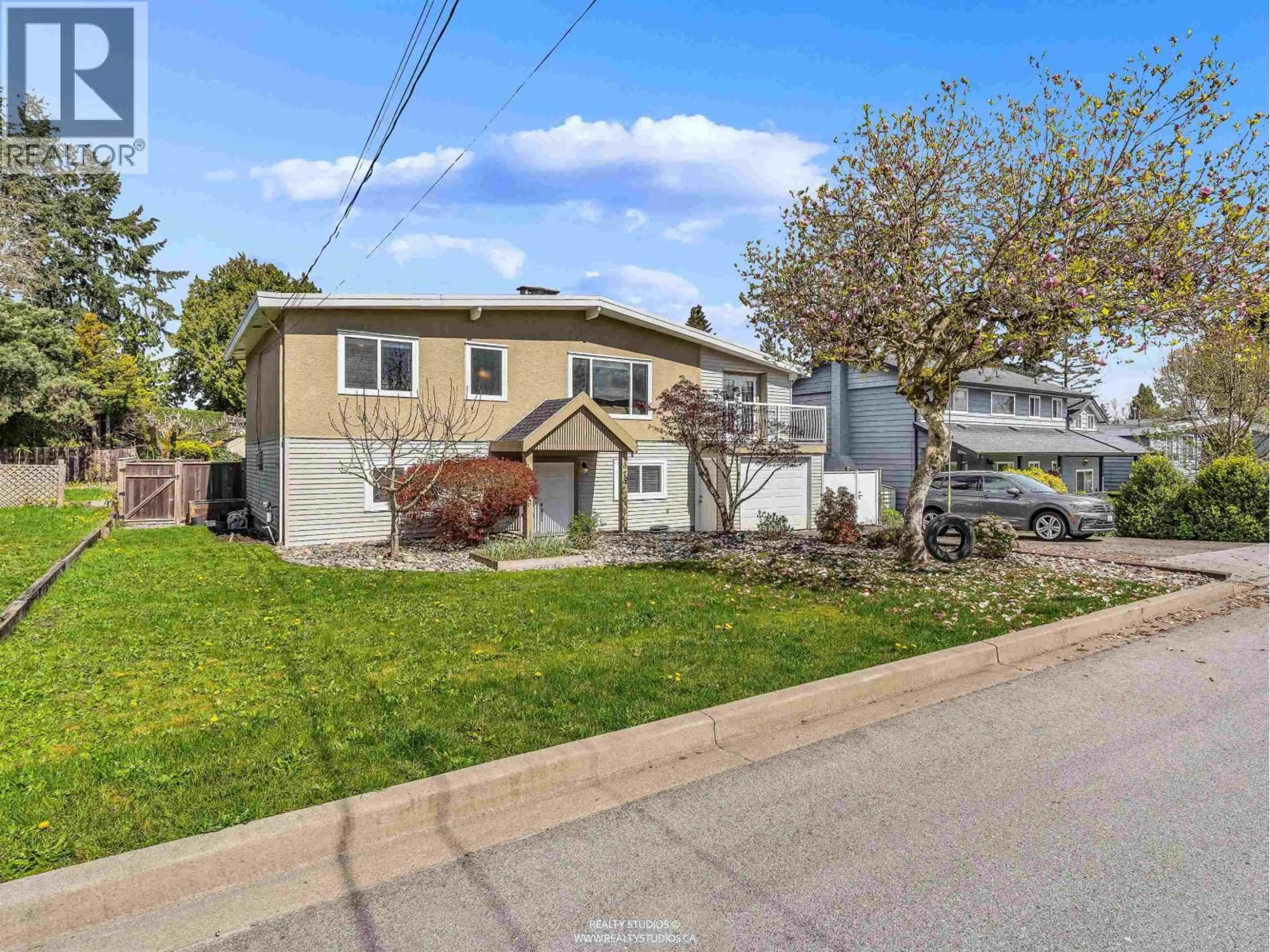 Home with vinyl exterior material, street for 1975 ROUTLEY AVENUE, Port Coquitlam British Columbia V3C1A8