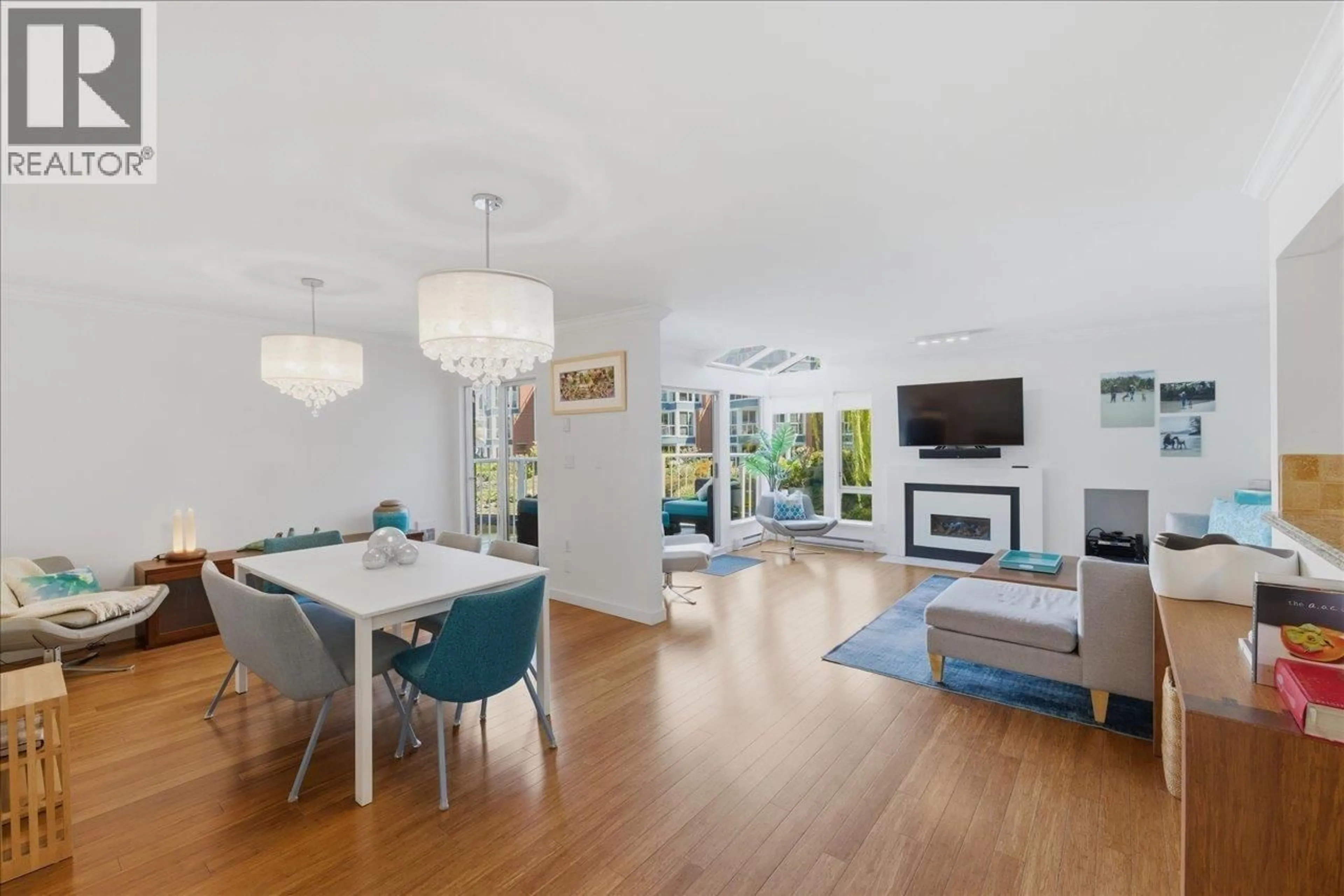 Living room with furniture, wood/laminate floor for 1523 MARINER WALK, Vancouver British Columbia V6J5A6