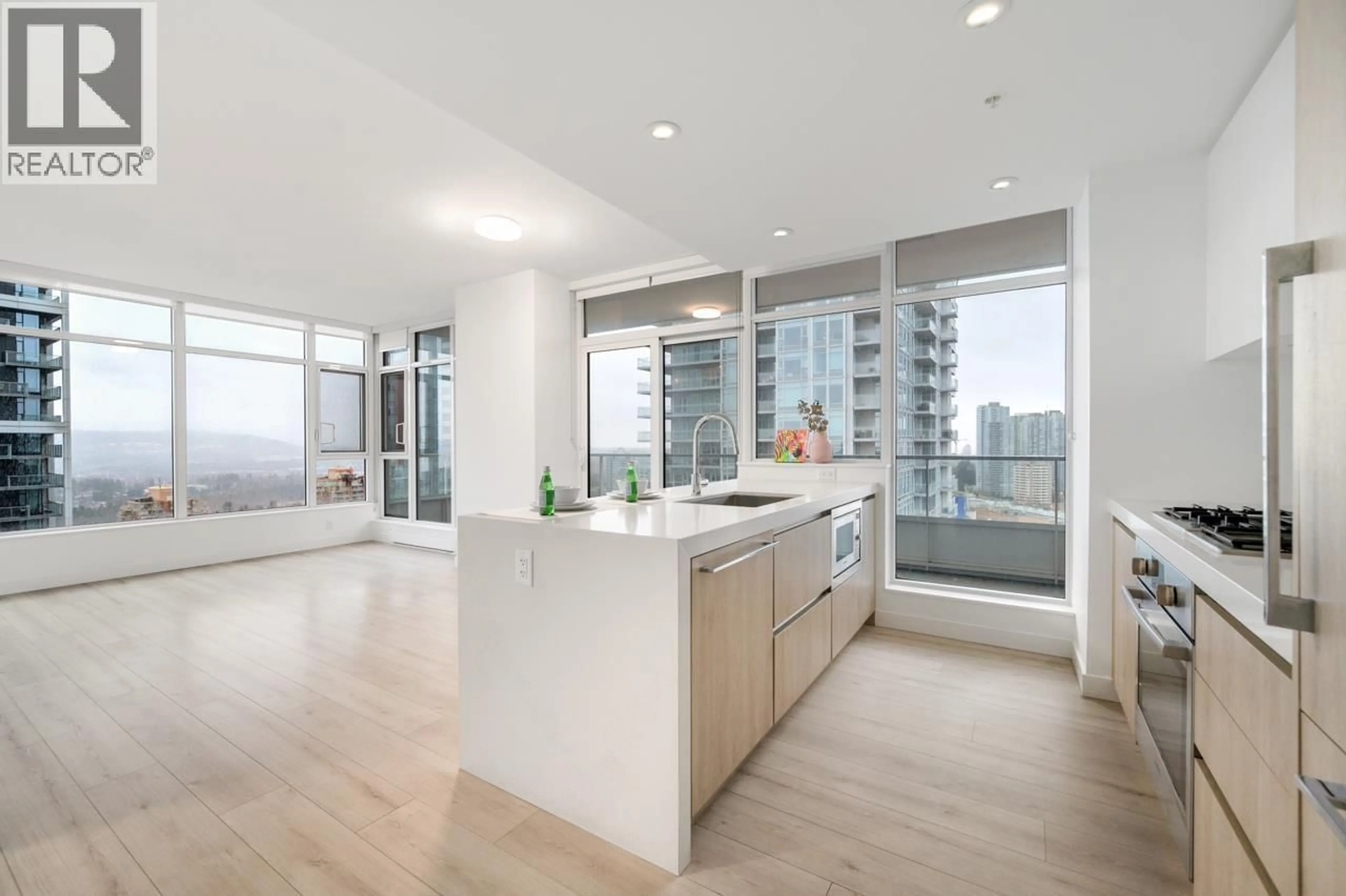 Open concept kitchen, wood/laminate floor for 2307 - 6080 MCKAY AVENUE, Burnaby British Columbia V5H0J4