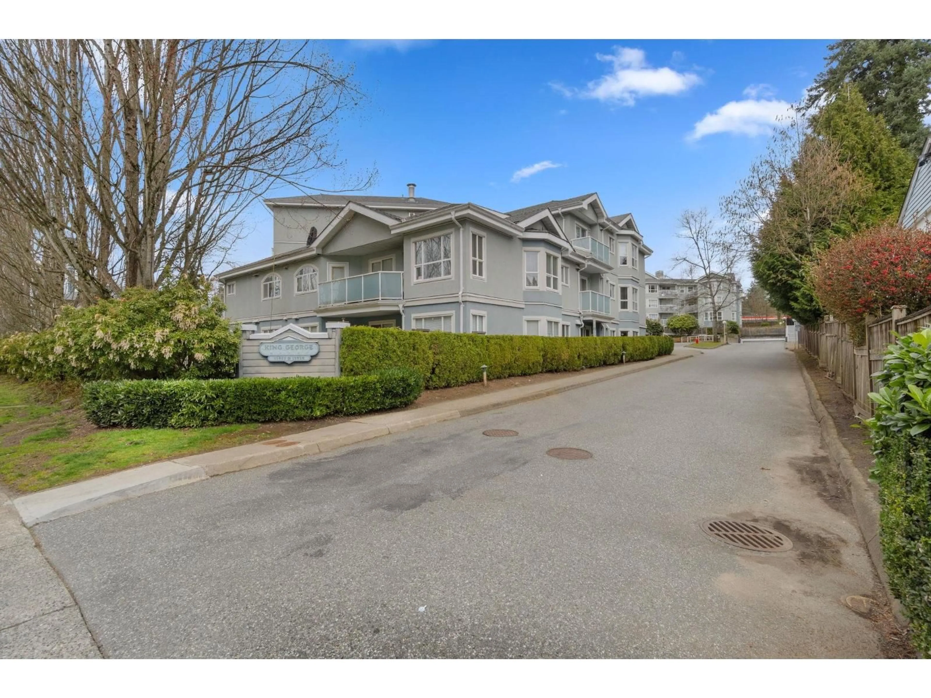 A pic from outside/outdoor area/front of a property/back of a property/a pic from drone, street for 405 - 13955 LAUREL DRIVE, Surrey British Columbia V3T1A8