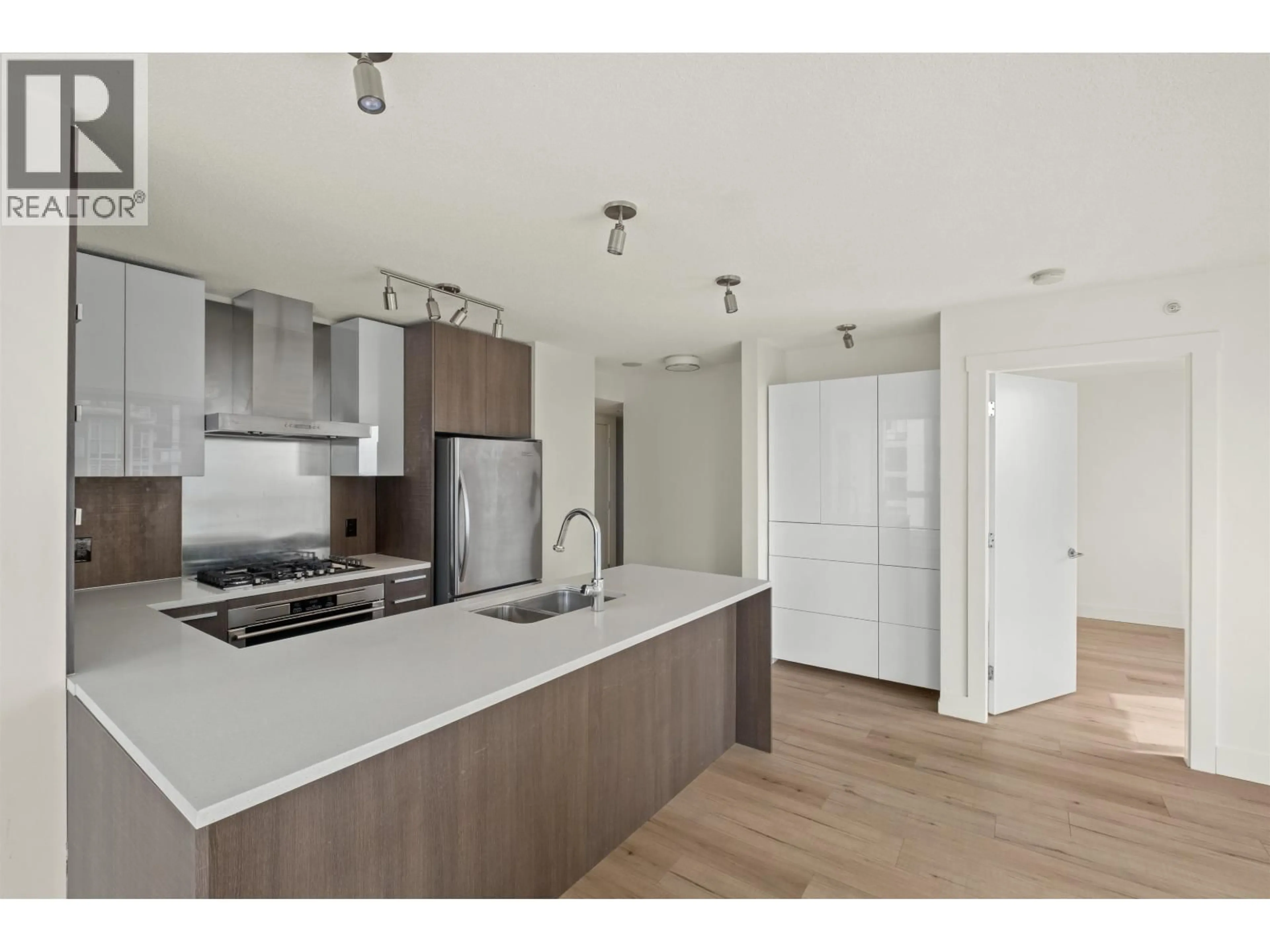 Open concept kitchen, unknown for 2306 - 3007 GLEN DRIVE, Coquitlam British Columbia V3B0L8