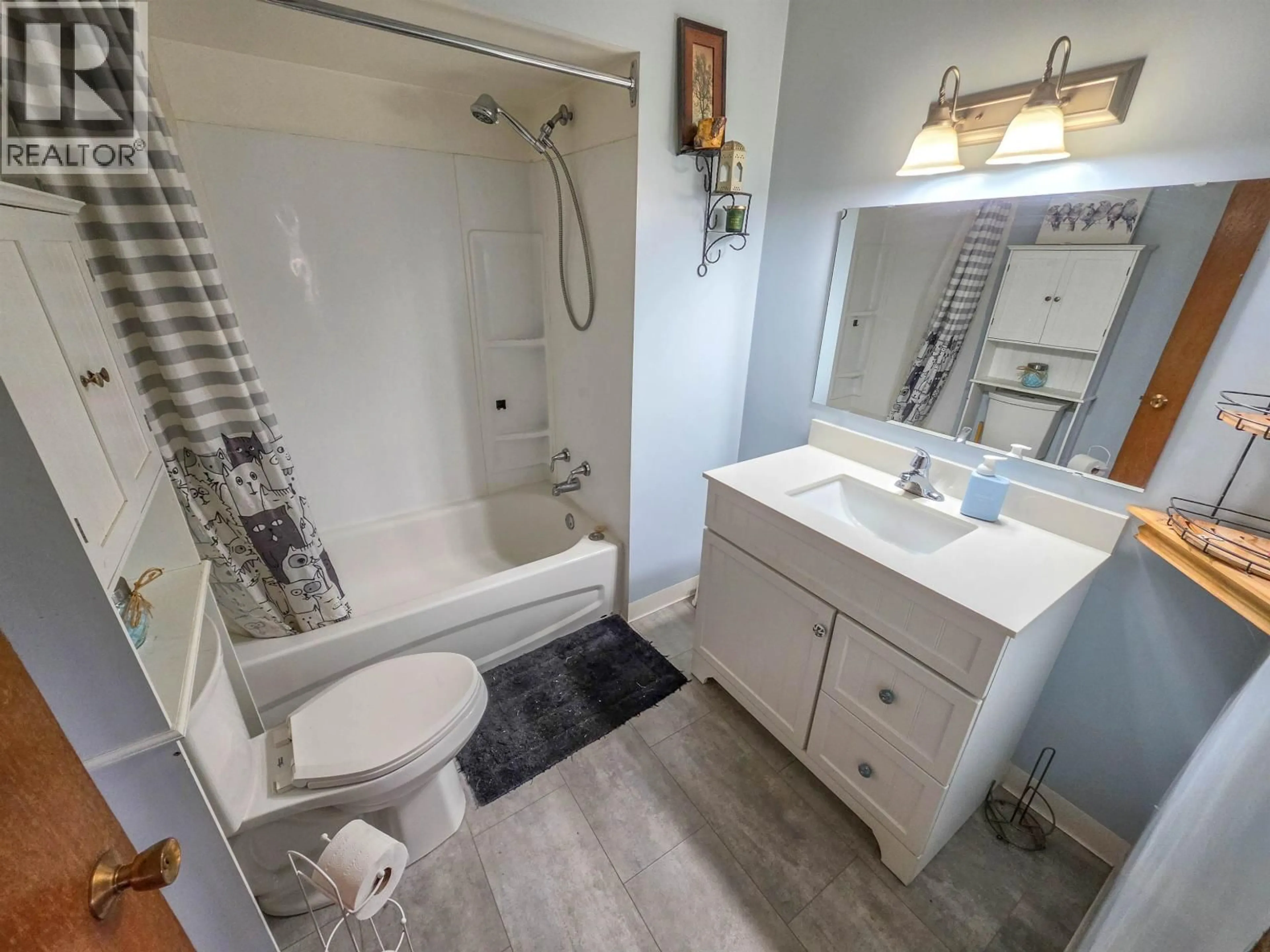 Standard bathroom, ceramic/tile floor for 6732 LAGERQUIST ROAD, McLeese Lake British Columbia V0L1P0