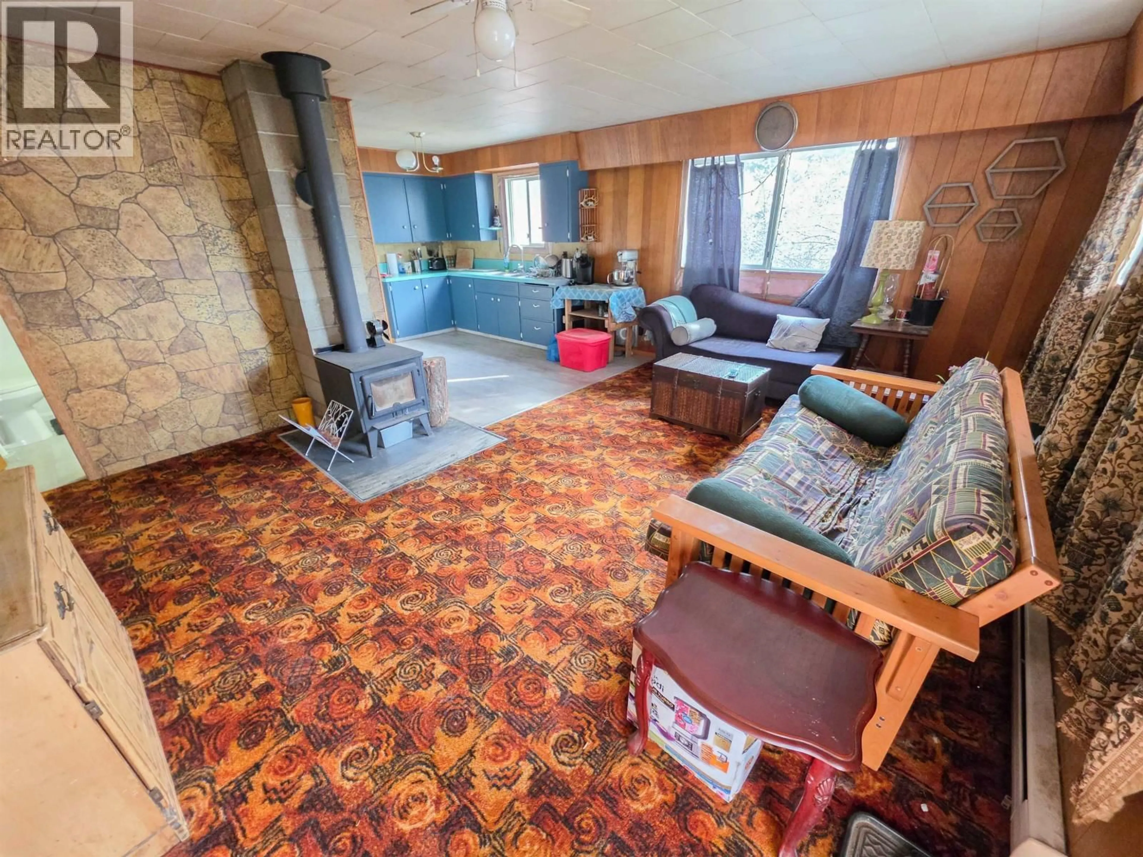 Living room with furniture, unknown for 6732 LAGERQUIST ROAD, McLeese Lake British Columbia V0L1P0