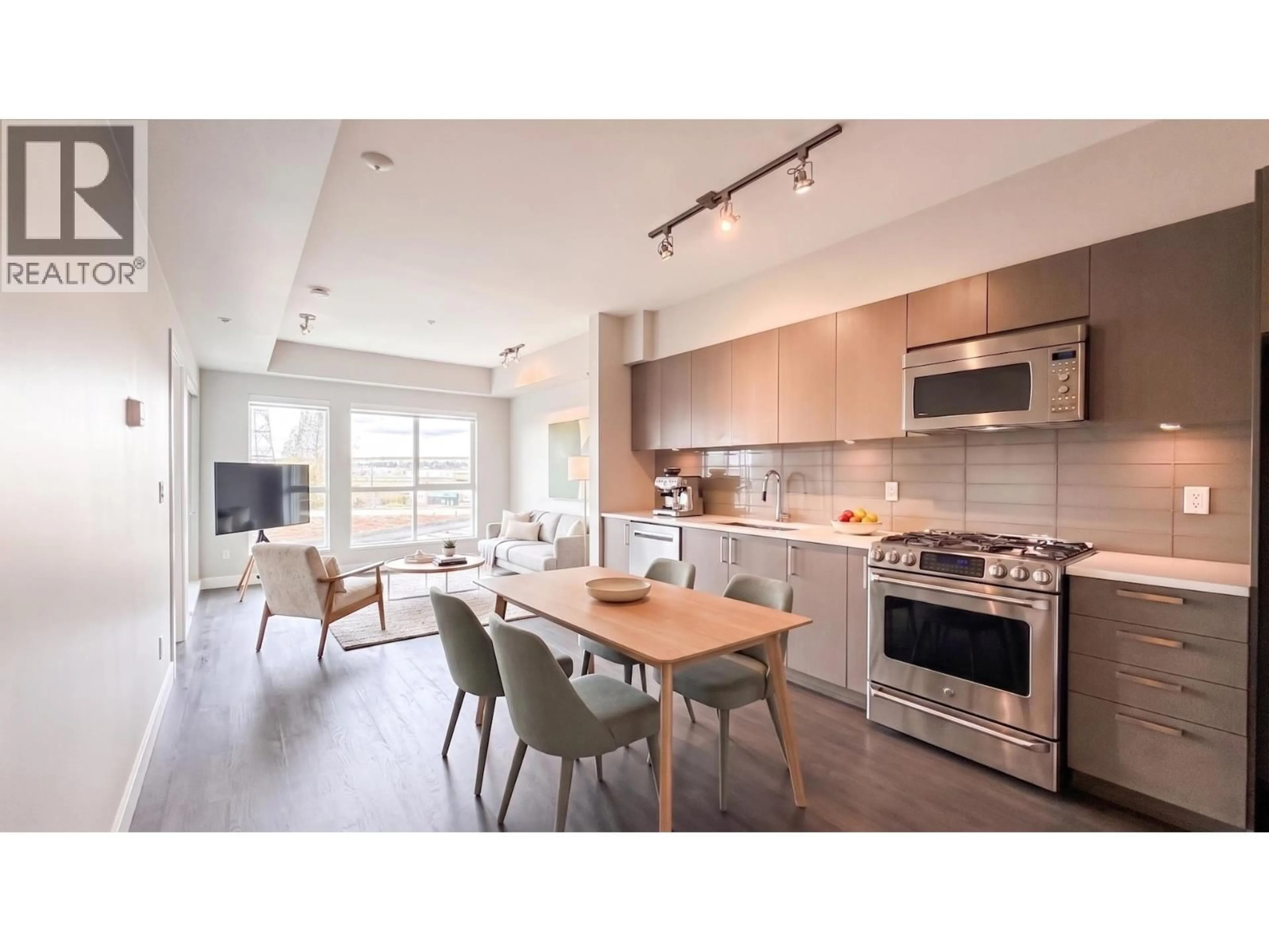 Open concept kitchen, wood/laminate floor for 307 - 10033 RIVER DRIVE, Richmond British Columbia V6X0L1
