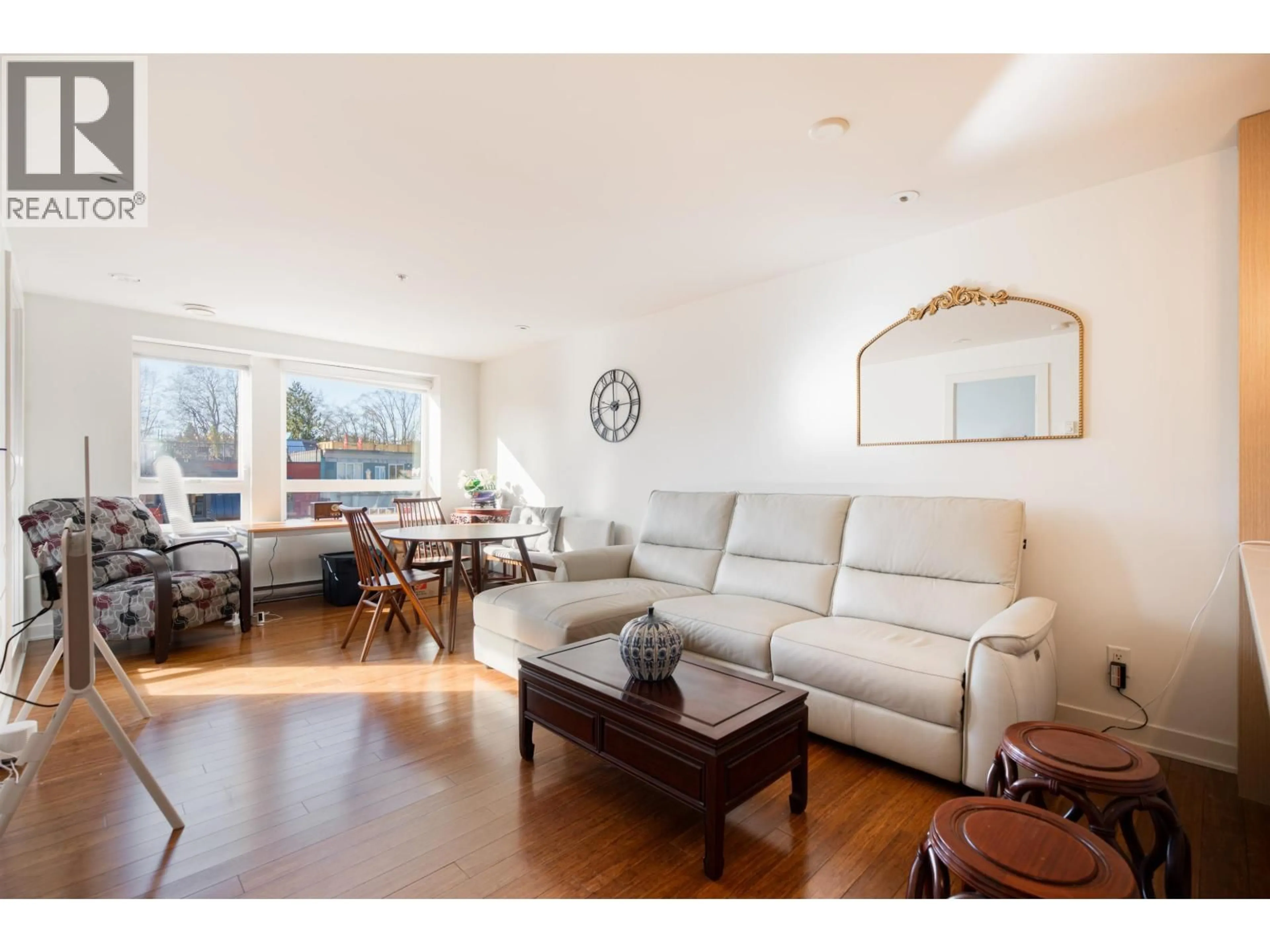 Living room with furniture, wood/laminate floor for 403 - 2481 WATERLOO STREET, Vancouver British Columbia V6R3H4