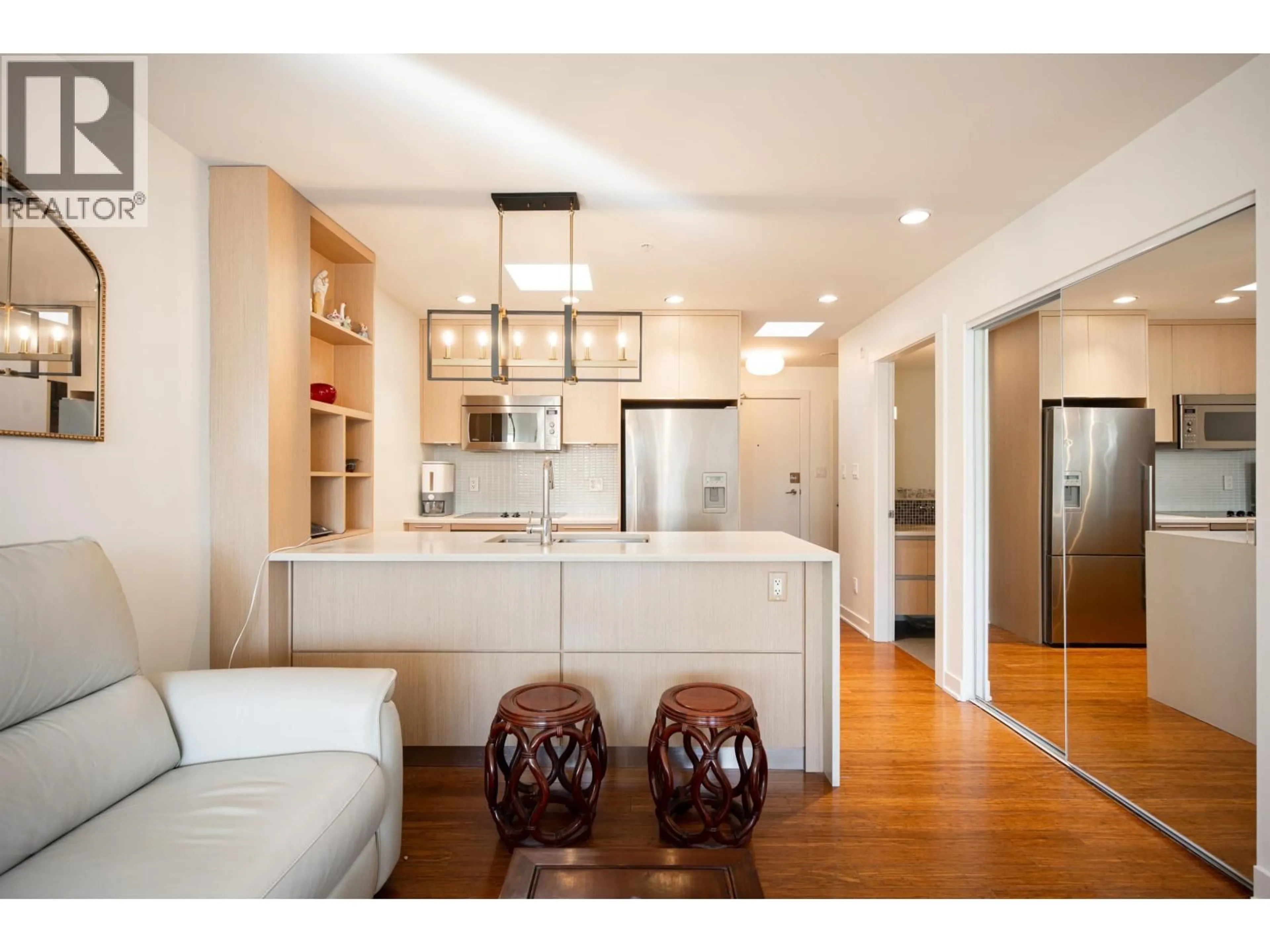 Open concept kitchen, wood/laminate floor for 403 - 2481 WATERLOO STREET, Vancouver British Columbia V6R3H4