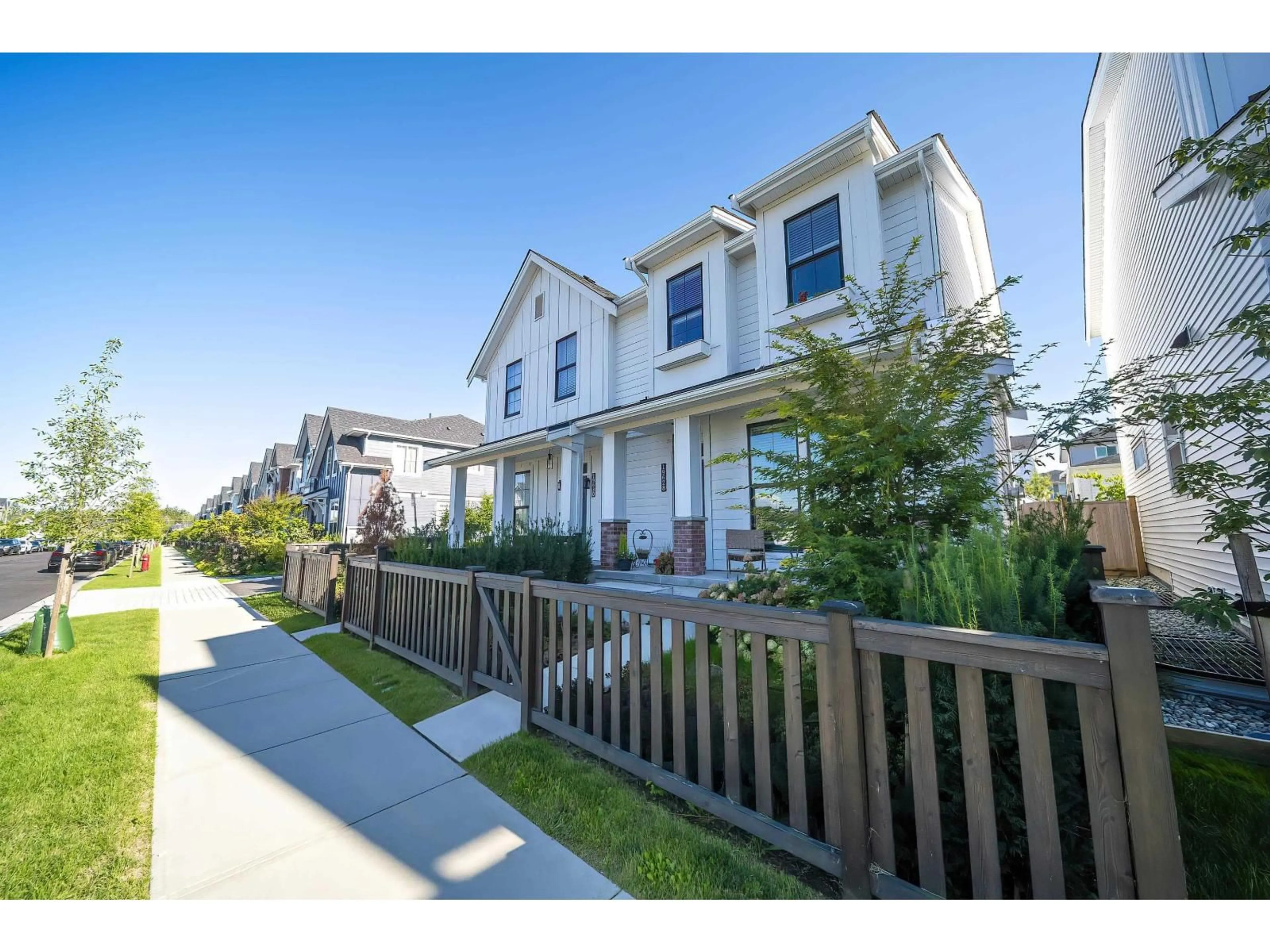 Home with vinyl exterior material, street for 19628 75A AVENUE, Langley British Columbia V2Y3T2