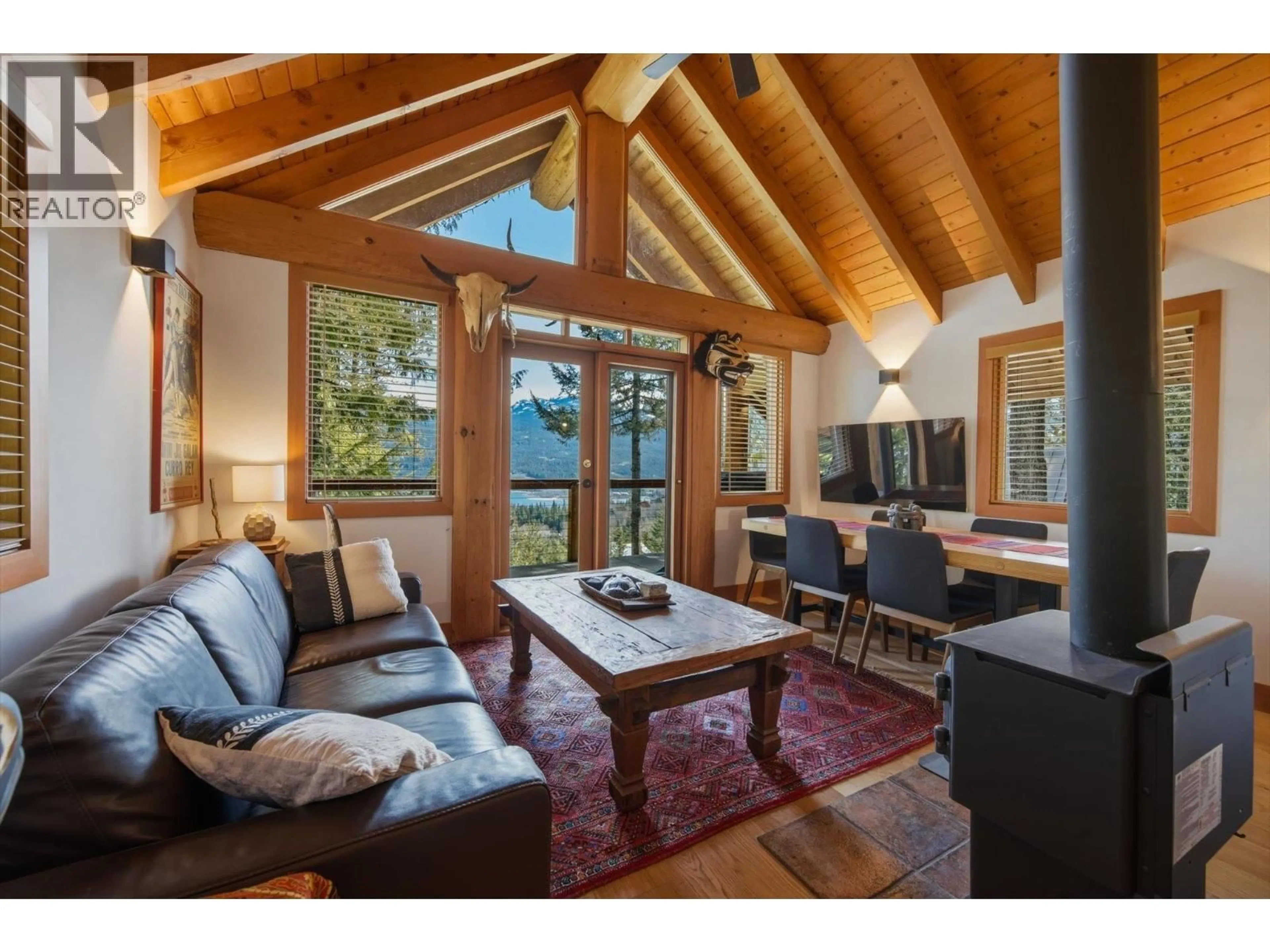 Living room with furniture, wood/laminate floor for 8396 MOUNTAIN VIEW DRIVE, Whistler British Columbia V8E0G3