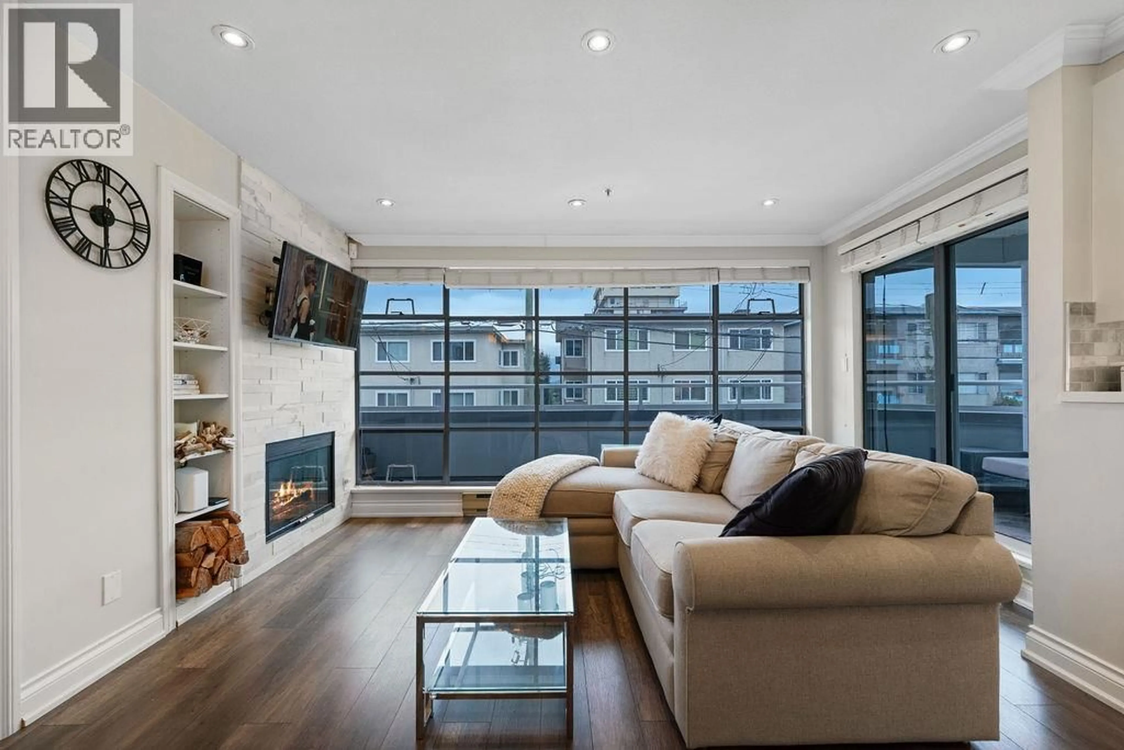 Living room with furniture, wood/laminate floor for 203 - 2287 3RD AVENUE, Vancouver British Columbia V6K1L5