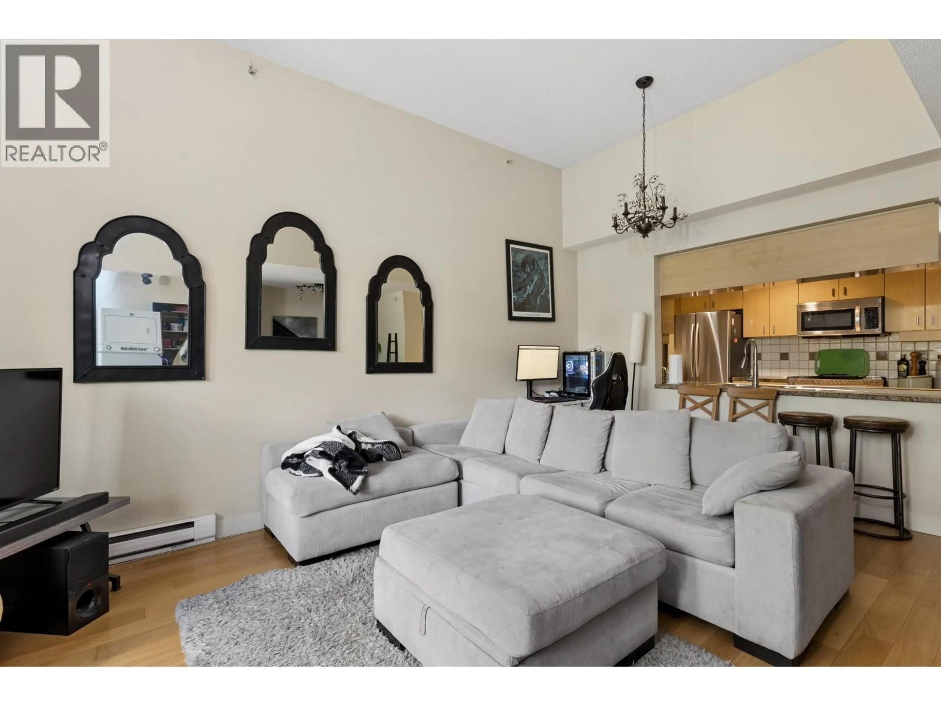 Living room with furniture, unknown for 2P - 1033 MARINASIDE CRESCENT, Vancouver British Columbia V6Z3A3