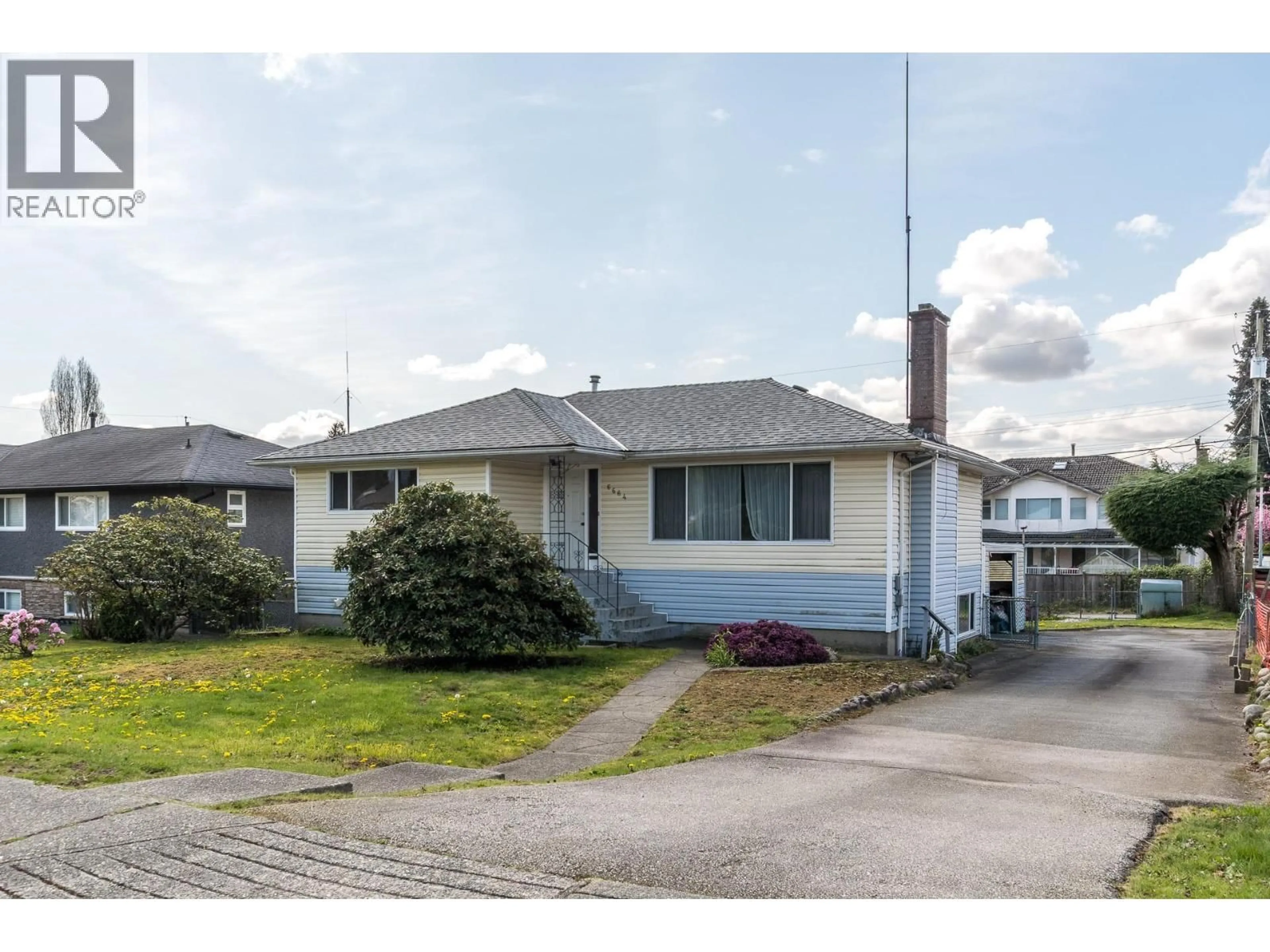 Home with vinyl exterior material, street for 6664 CHARLES STREET, Burnaby British Columbia V5B2H1