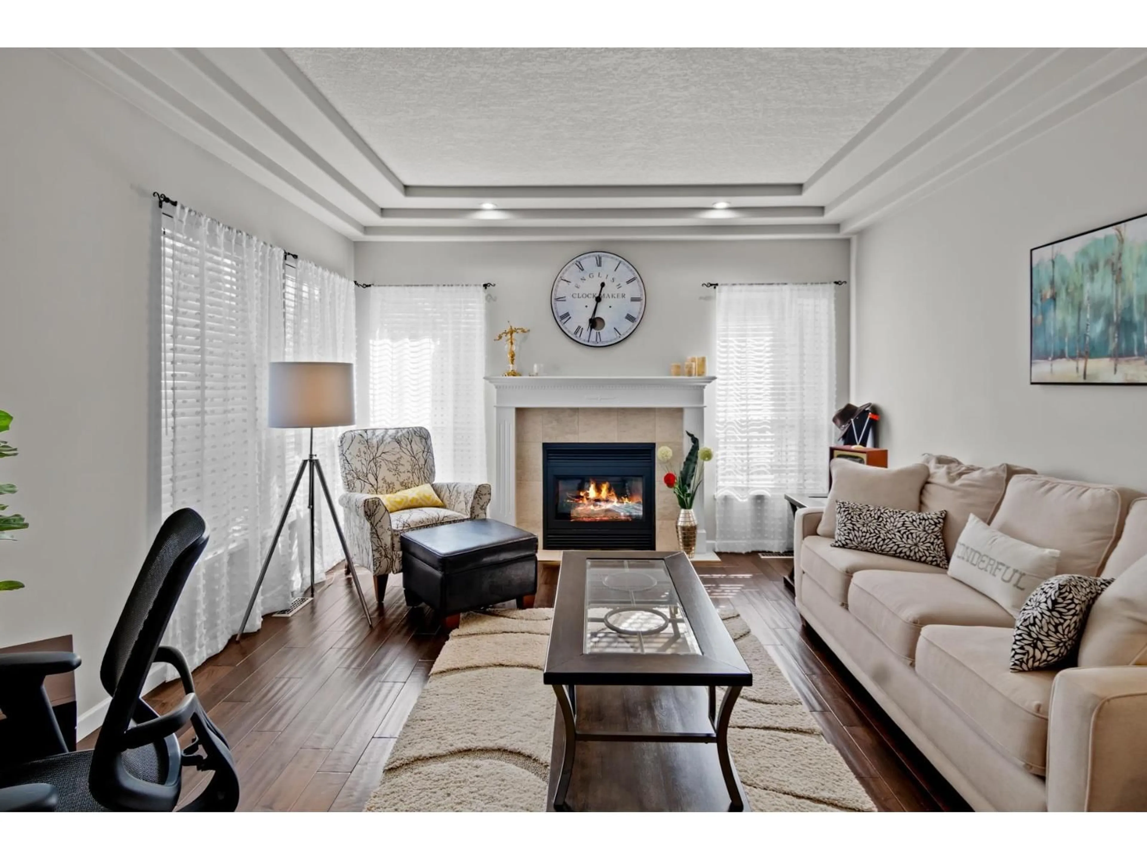 Living room with furniture, wood/laminate floor for 4115 BELANGER DRIVE, Abbotsford British Columbia V3G1K3