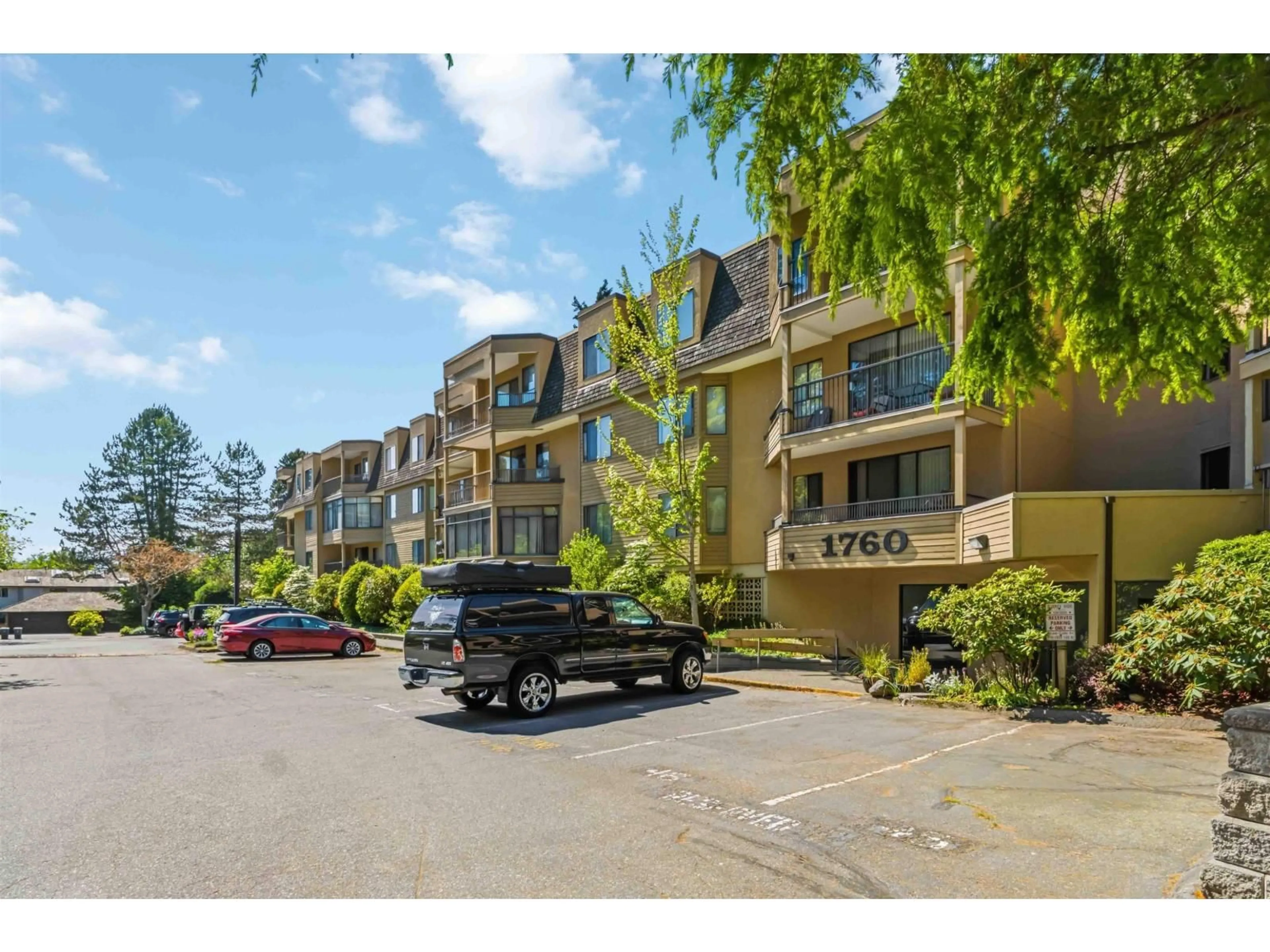 A pic from outside/outdoor area/front of a property/back of a property/a pic from drone, unknown for 214 - 1760 SOUTHMERE CRESCENT CRESCENT, Surrey British Columbia V4A6E5