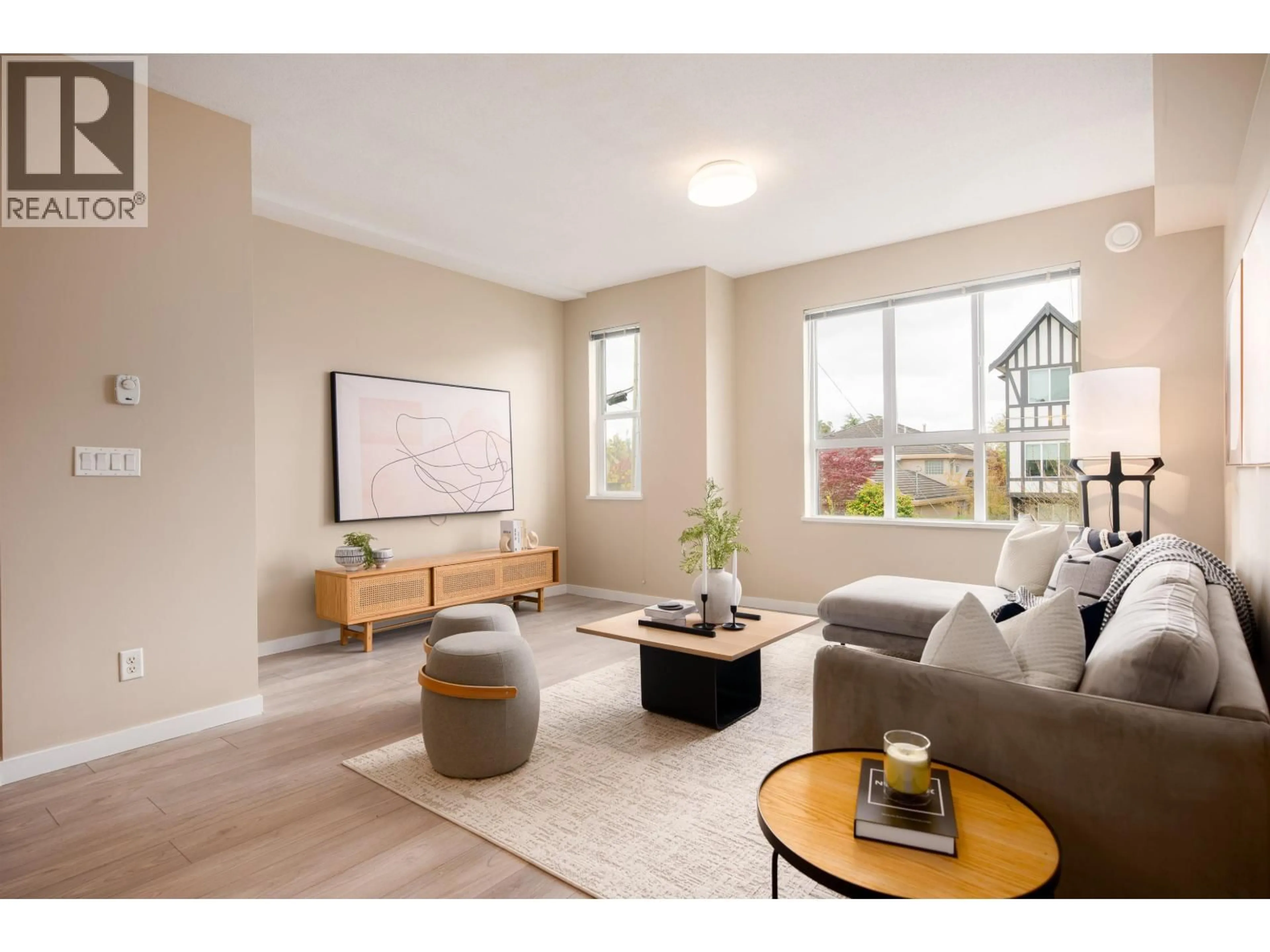 Living room with furniture, wood/laminate floor for 57 - 9566 TOMICKI AVENUE, Richmond British Columbia V6X0E6