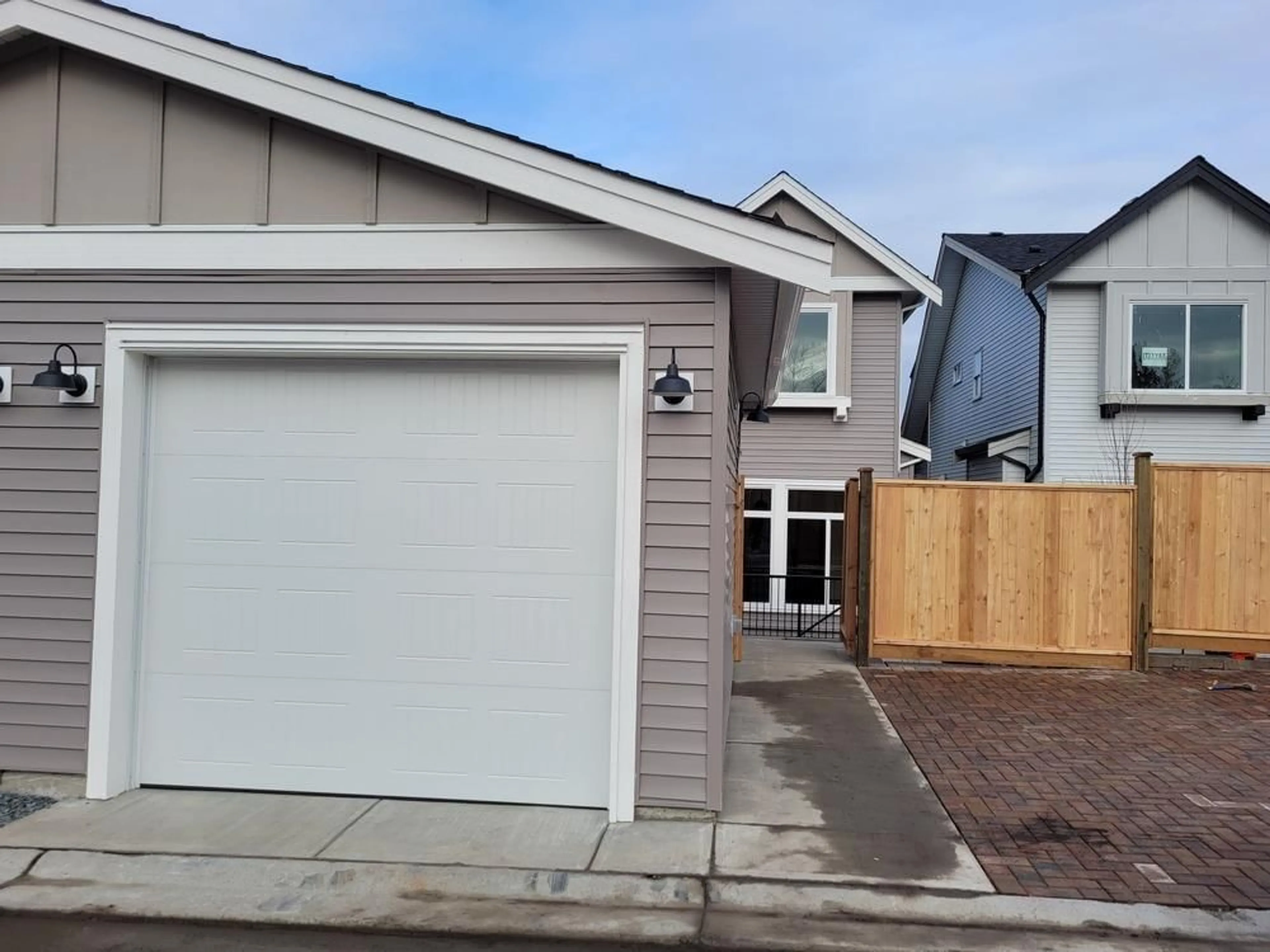 Home with vinyl exterior material, street for 19808 75A AVENUE, Langley British Columbia V2Y5K3