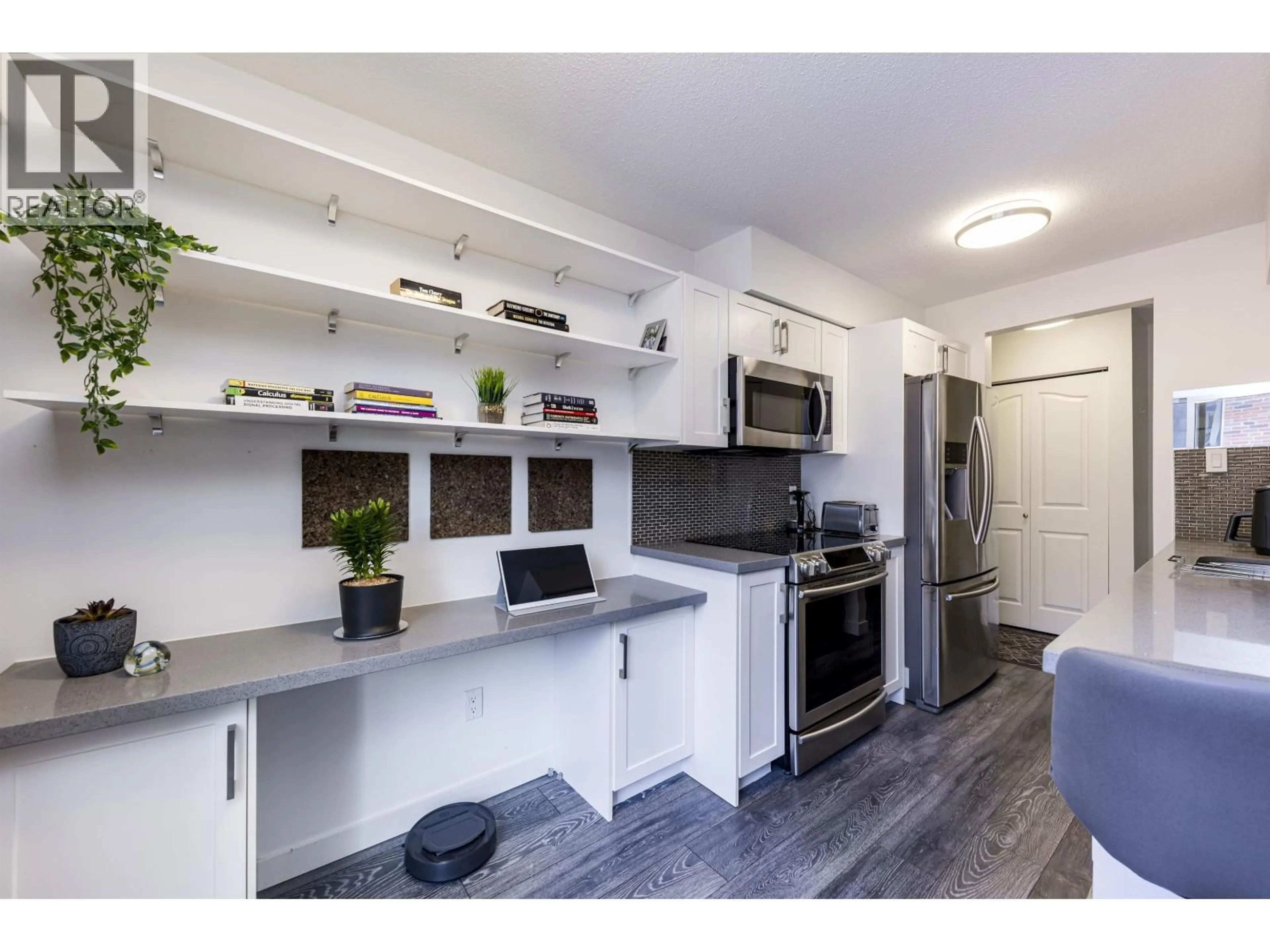 Open concept kitchen, unknown for 208 - 160 19TH STREET, North Vancouver British Columbia V7L2Y8