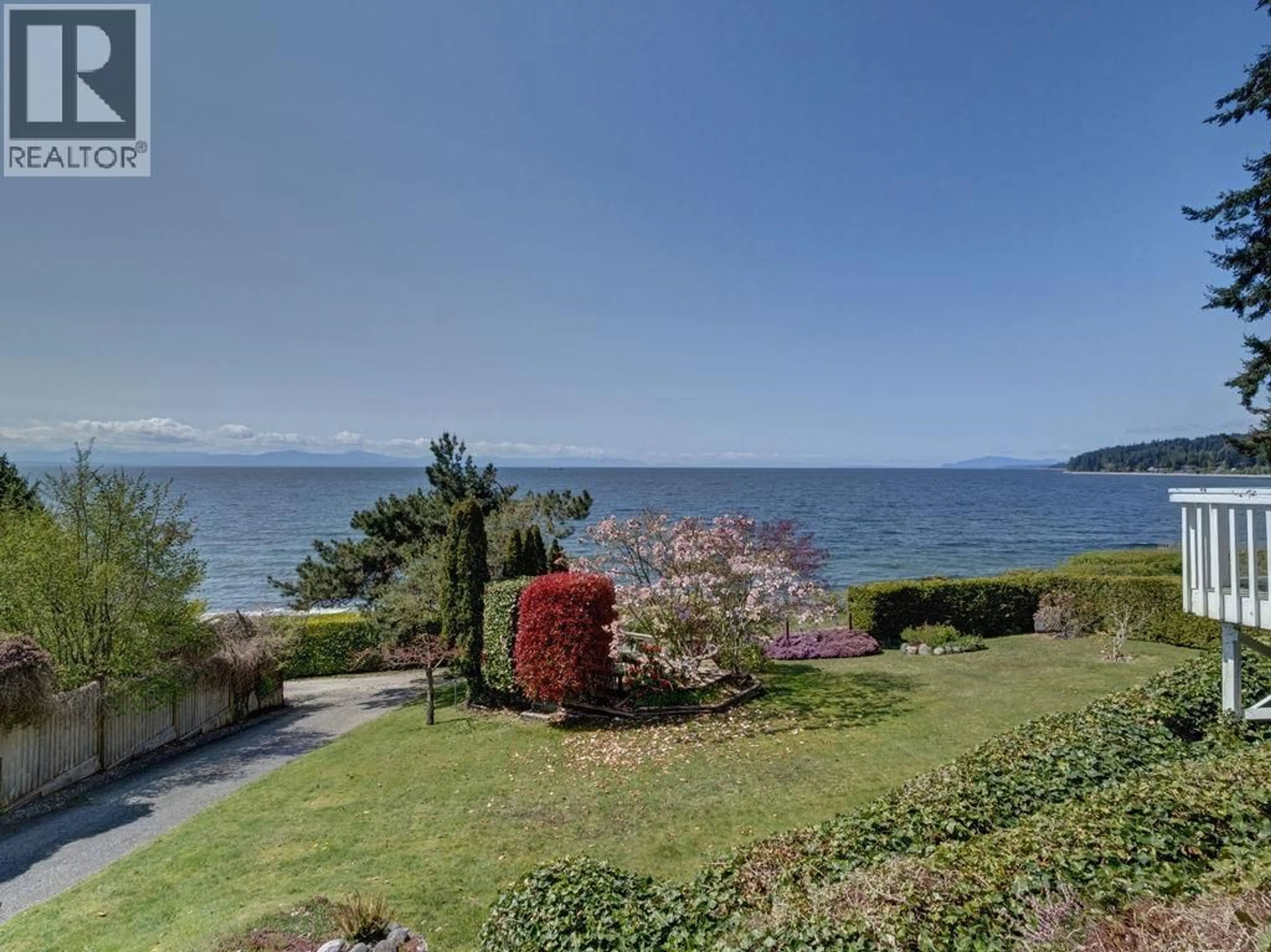 A pic from outside/outdoor area/front of a property/back of a property/a pic from drone, water/lake/river/ocean view for 1708 OCEAN BEACH, Gibsons British Columbia V0N1V5