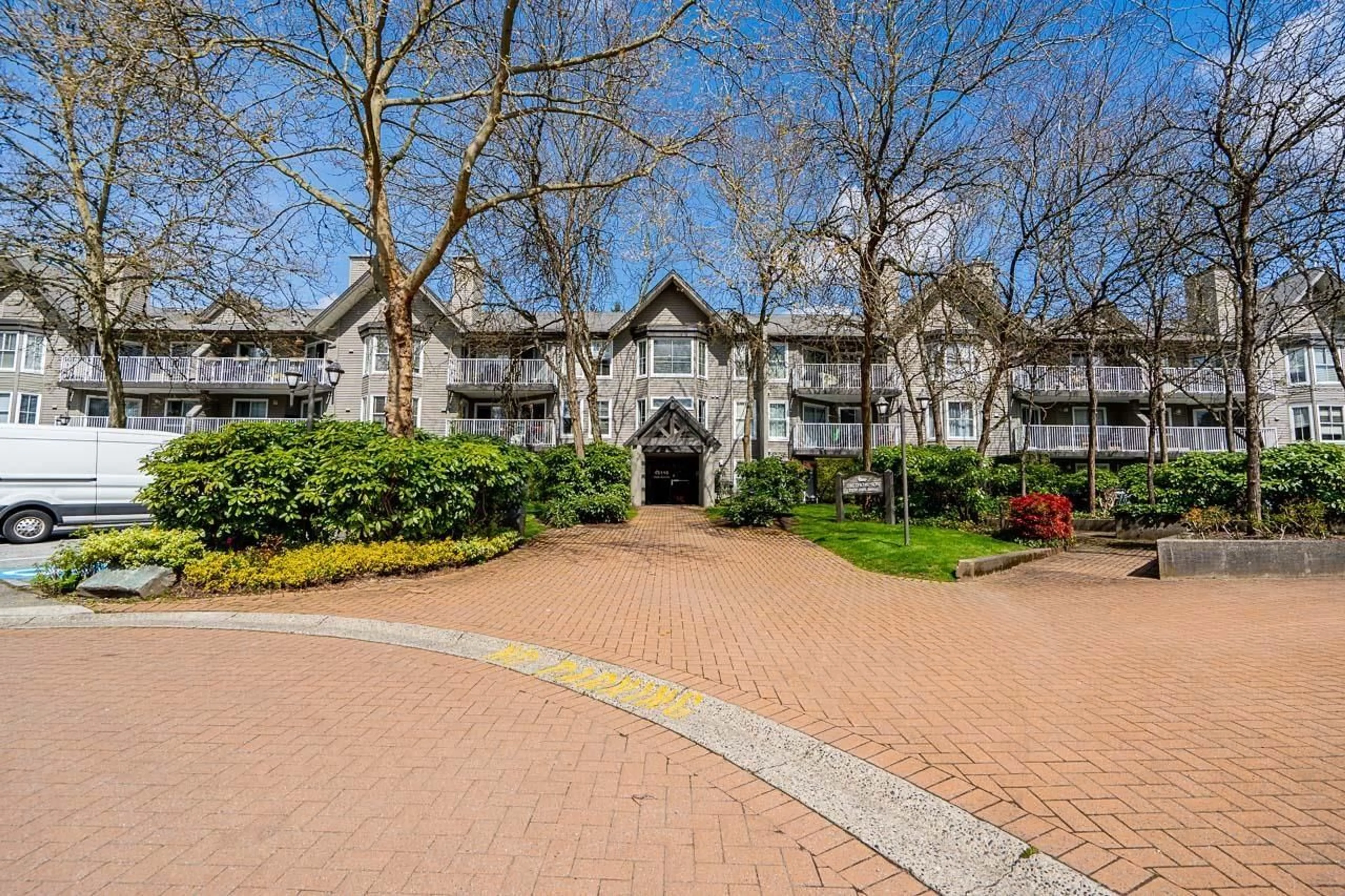 A pic from outside/outdoor area/front of a property/back of a property/a pic from drone, street for 201 - 15110 108 AVENUE, Surrey British Columbia V3R0T6