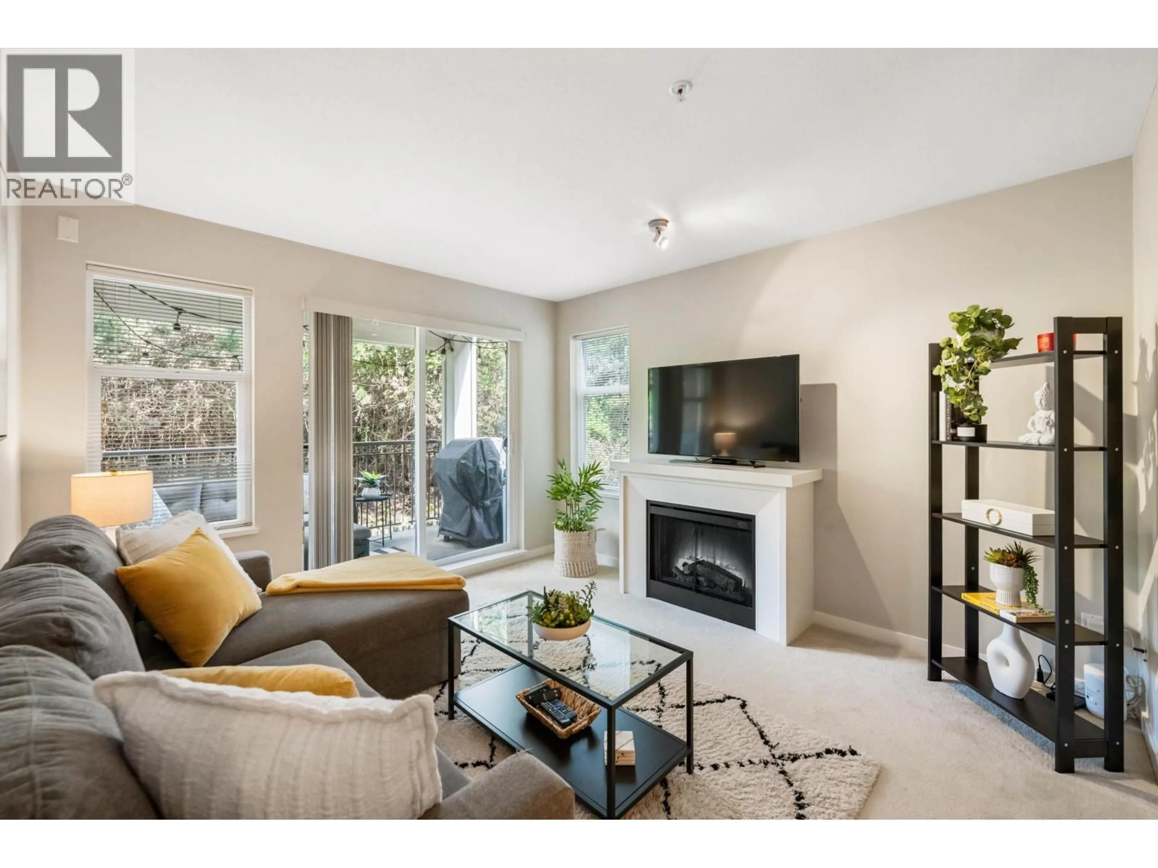 Living room with furniture, unknown for 317 - 4799 BRENTWOOD DRIVE, Burnaby British Columbia V5C0C4