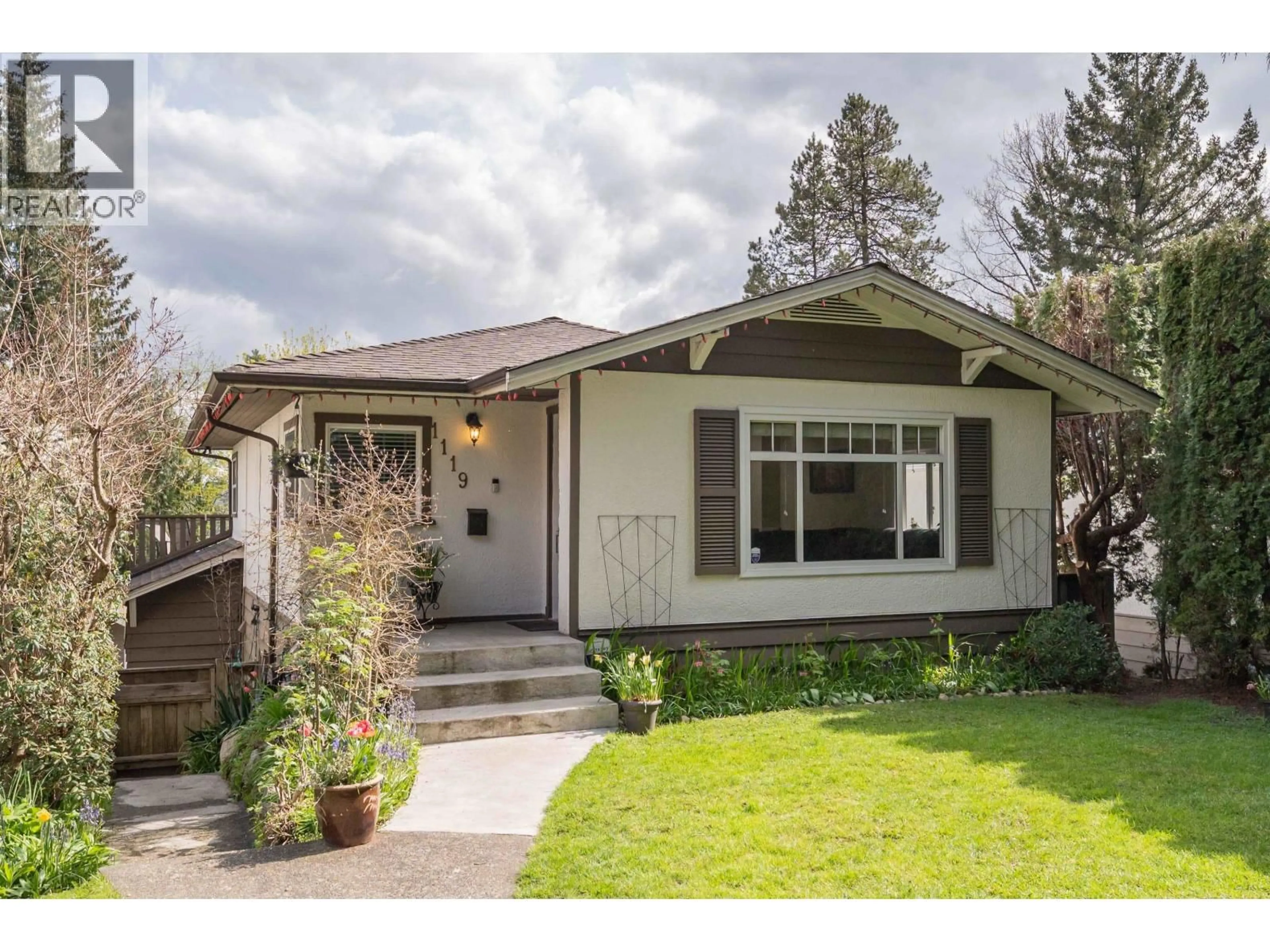 Home with vinyl exterior material, street for 1119 CLOVERLEY STREET, North Vancouver British Columbia V7L1N7