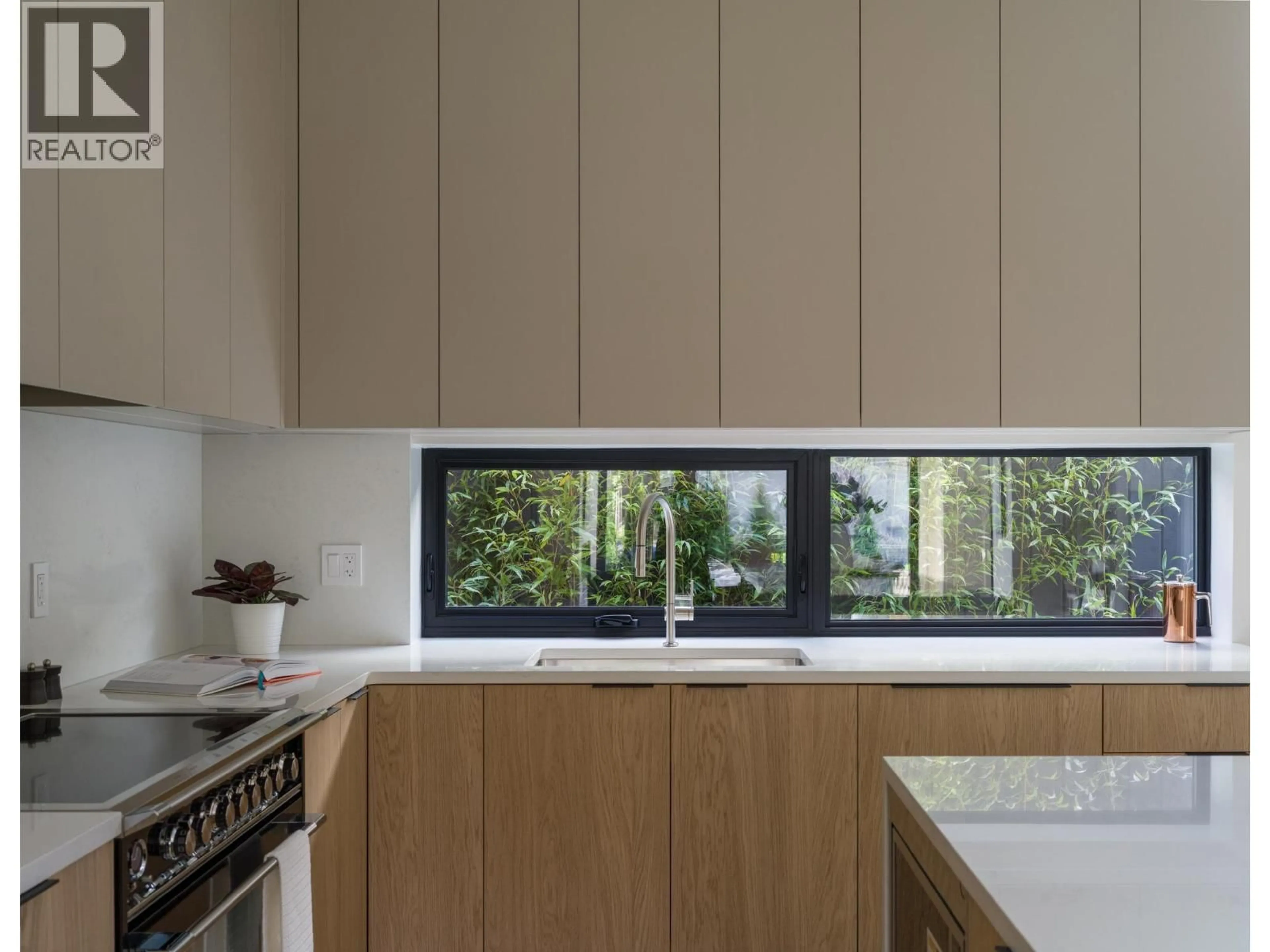 Contemporary kitchen, wood/laminate floor for 893 21ST AVENUE, Vancouver British Columbia V5V1S3