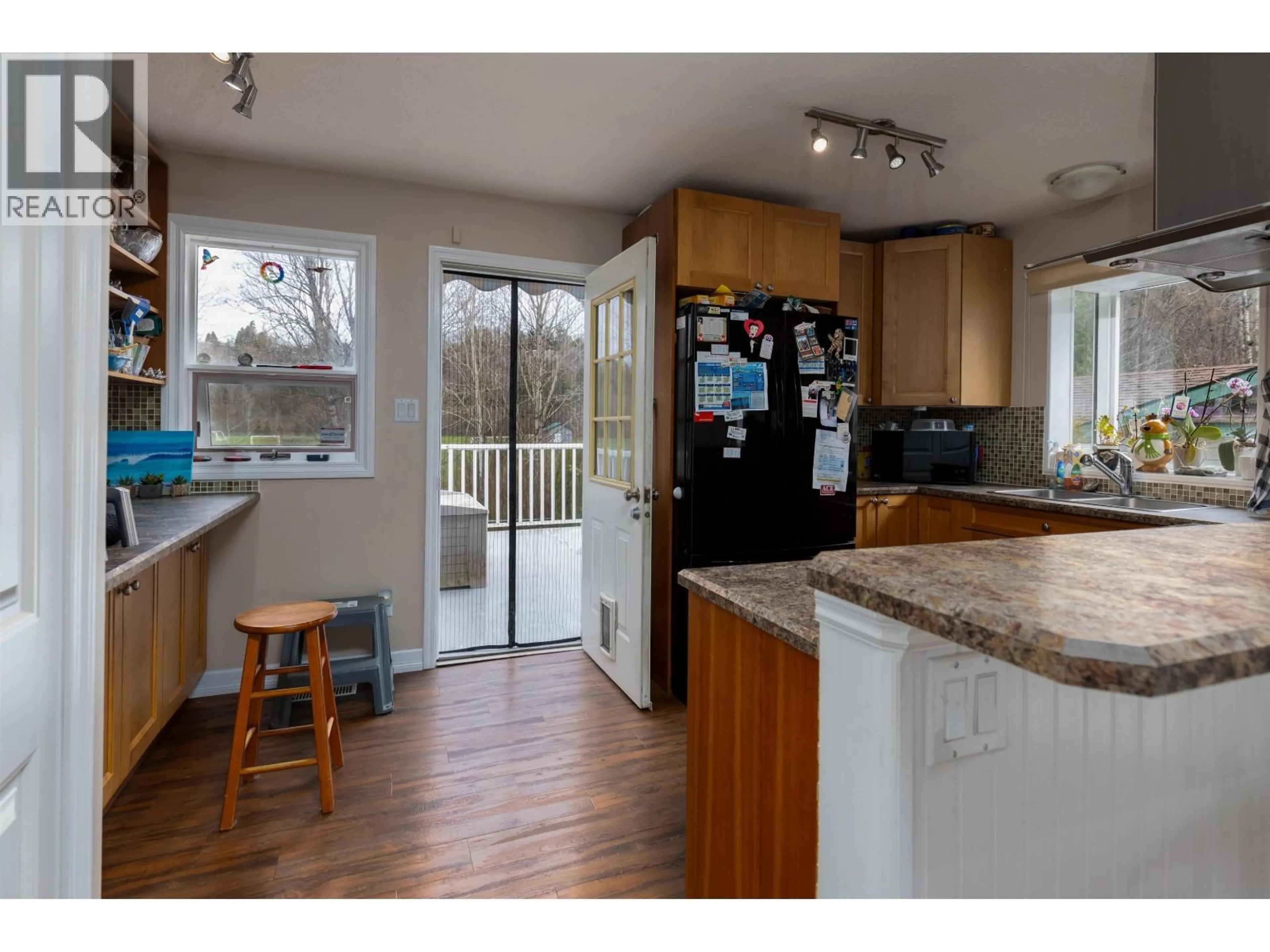 Open concept kitchen, wood/laminate floor for 4712 MCCONNELL AVENUE, Terrace British Columbia V8G2G8