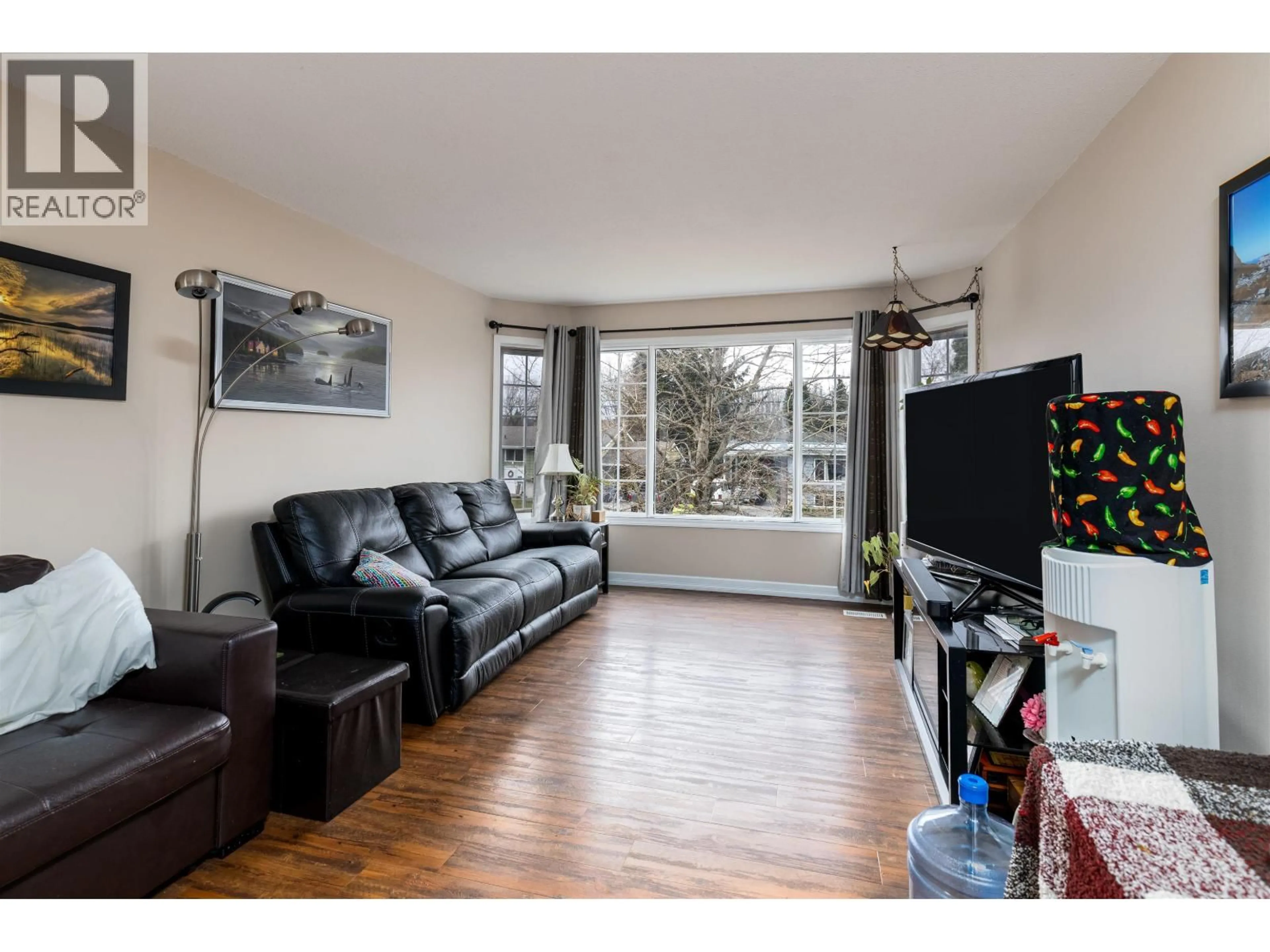 Living room with furniture, wood/laminate floor for 4712 MCCONNELL AVENUE, Terrace British Columbia V8G2G8